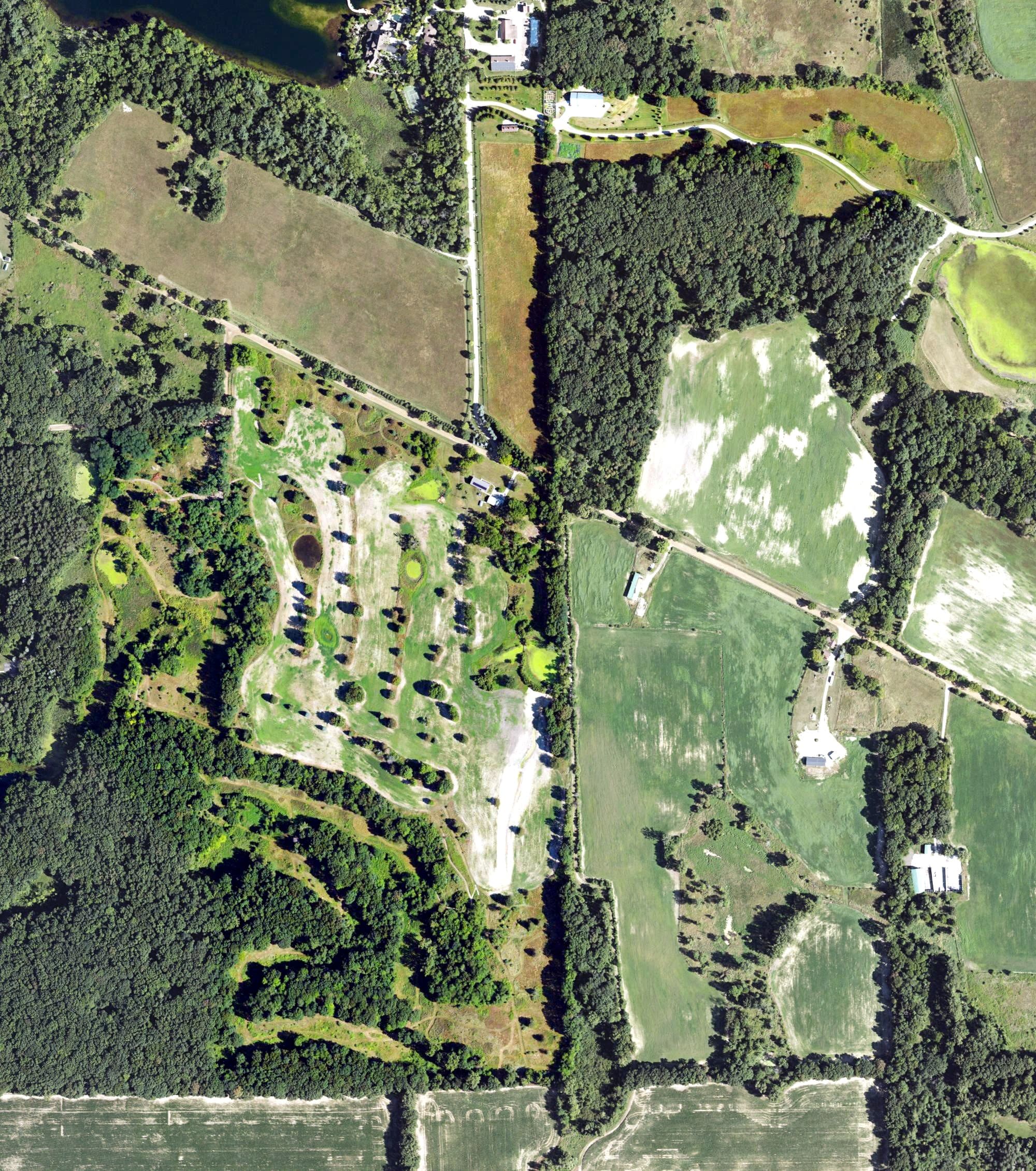 Aerial view of Bramblewood Country Club, MI, with its hole routing marked