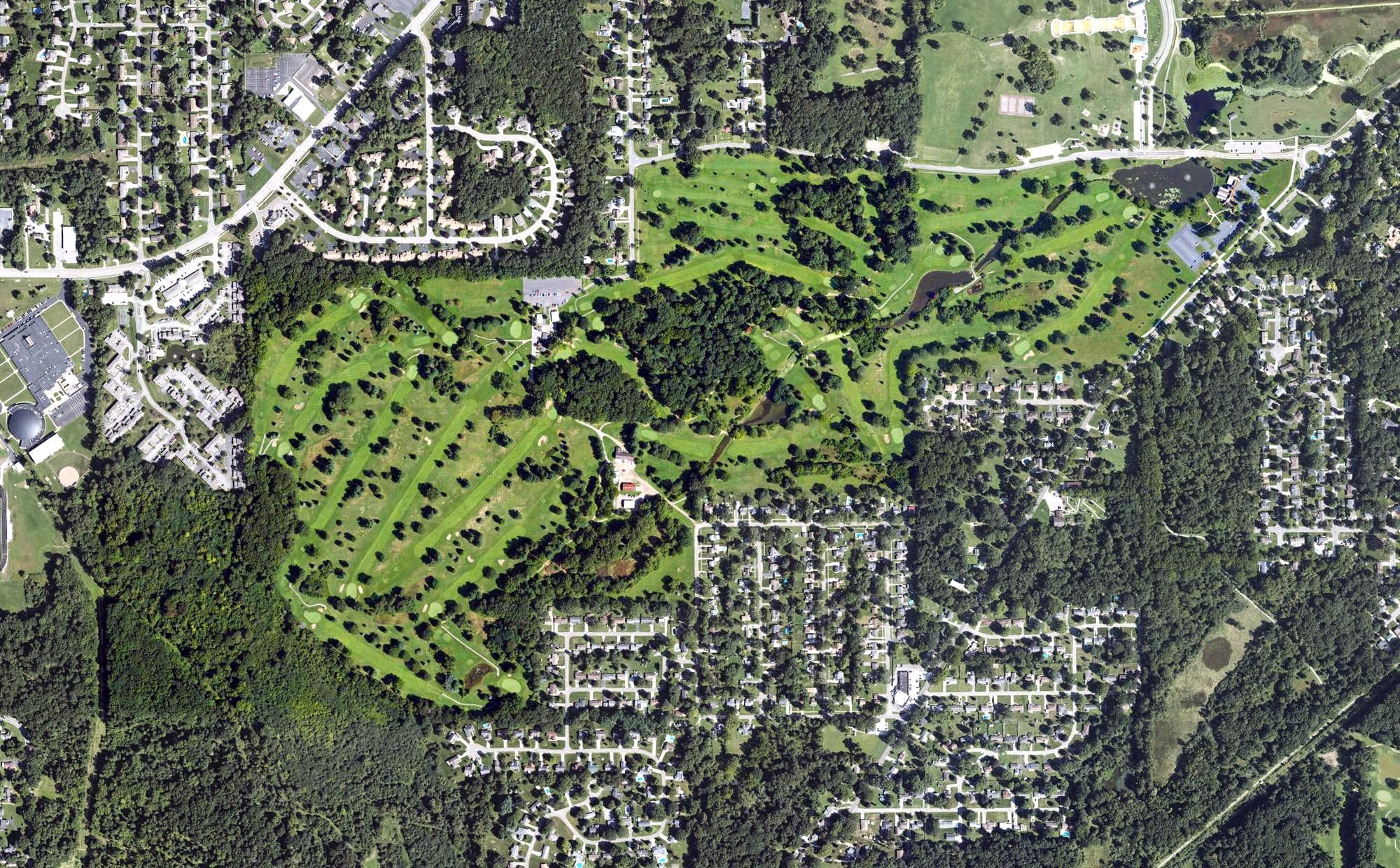 Aerial view of Cascades Golf Course, MI, with its hole routing marked
