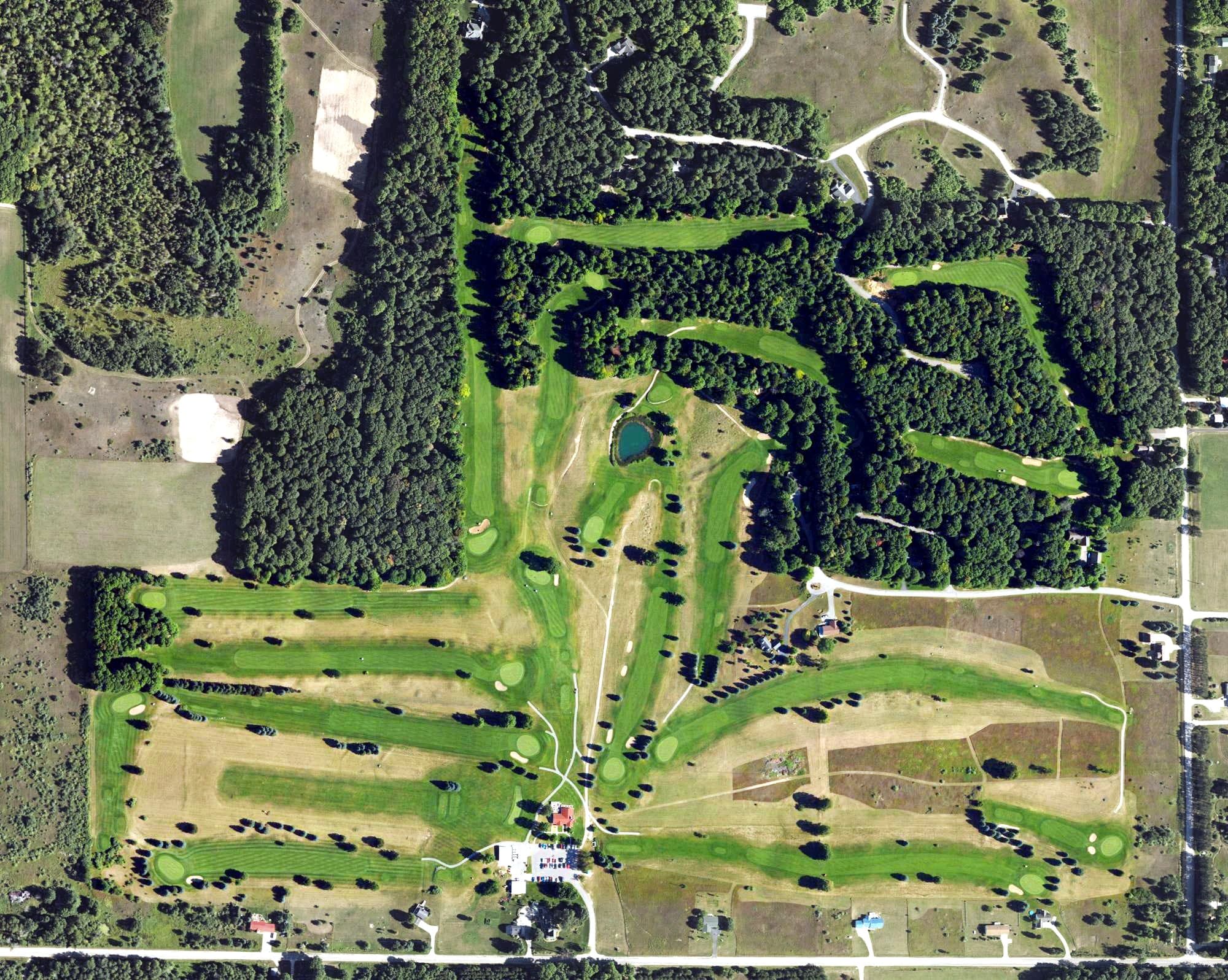 Aerial view of Centennial Farm Golf Club, MI, with its hole routing marked