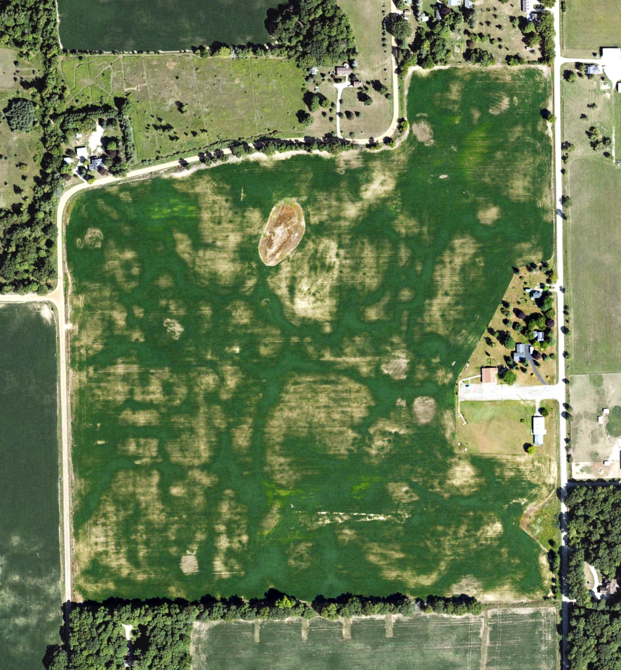 Aerial view of Chippewa Hills Country Club, MI, with its hole routing marked