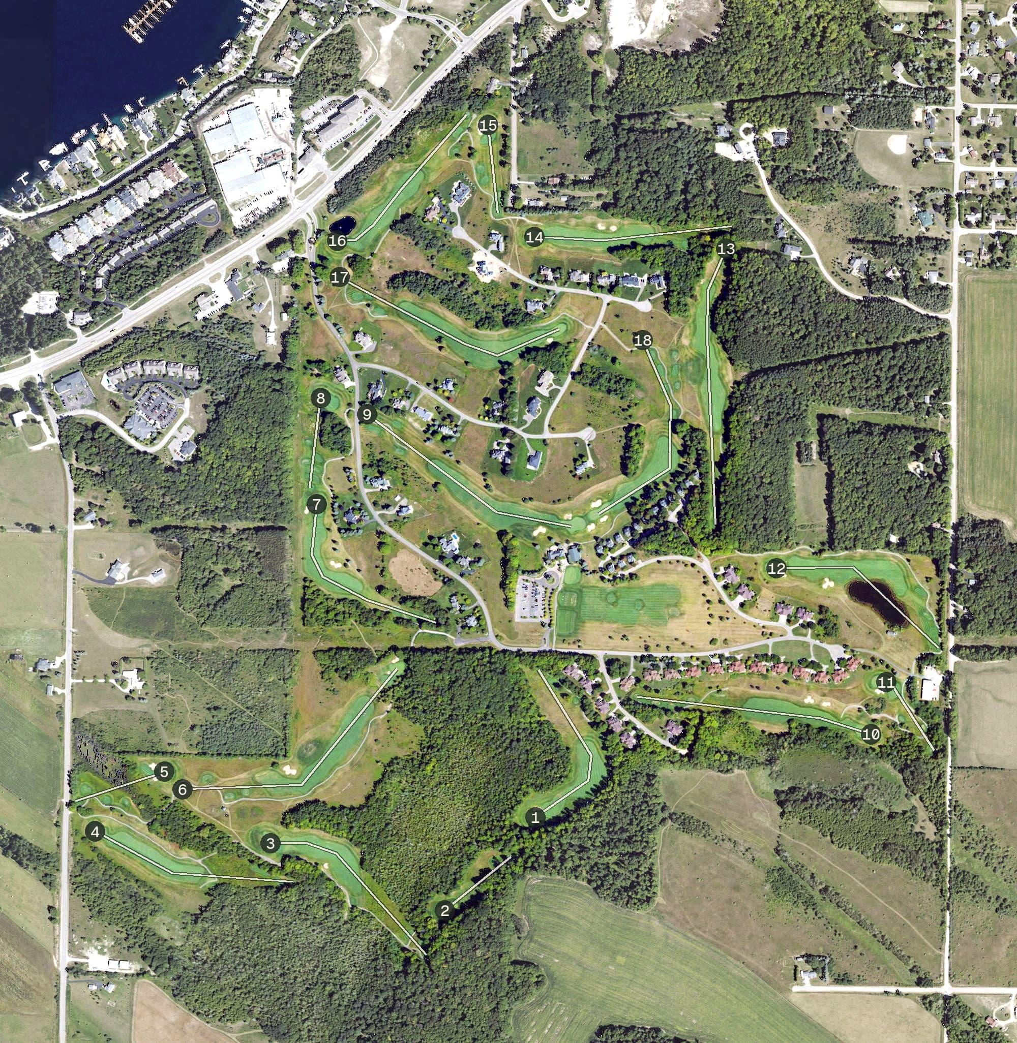 Aerial view of Crooked Tree Golf Club, MI, with its hole routing marked