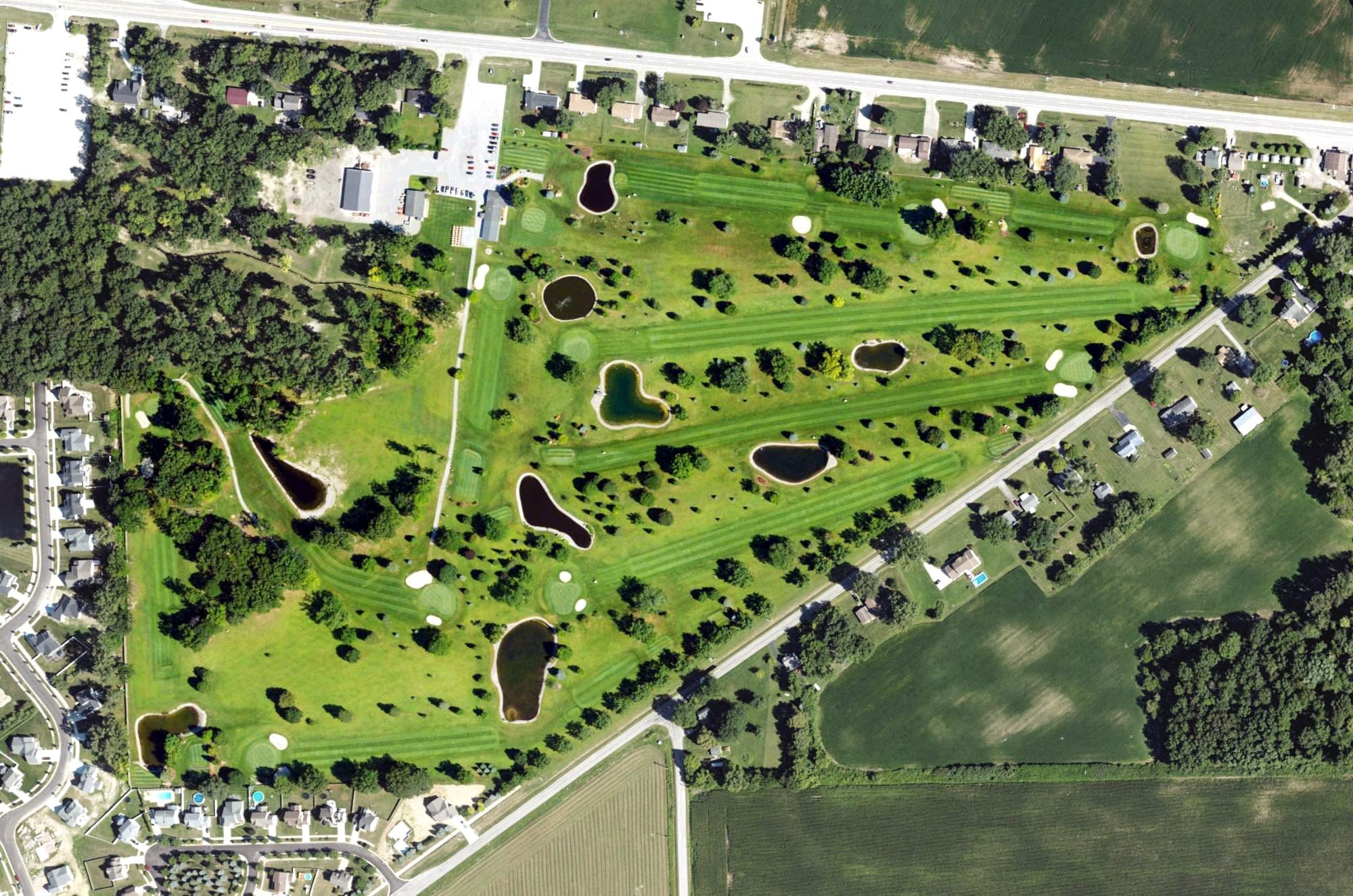 Aerial view of Dundee Golf Club, MI, with its hole routing marked