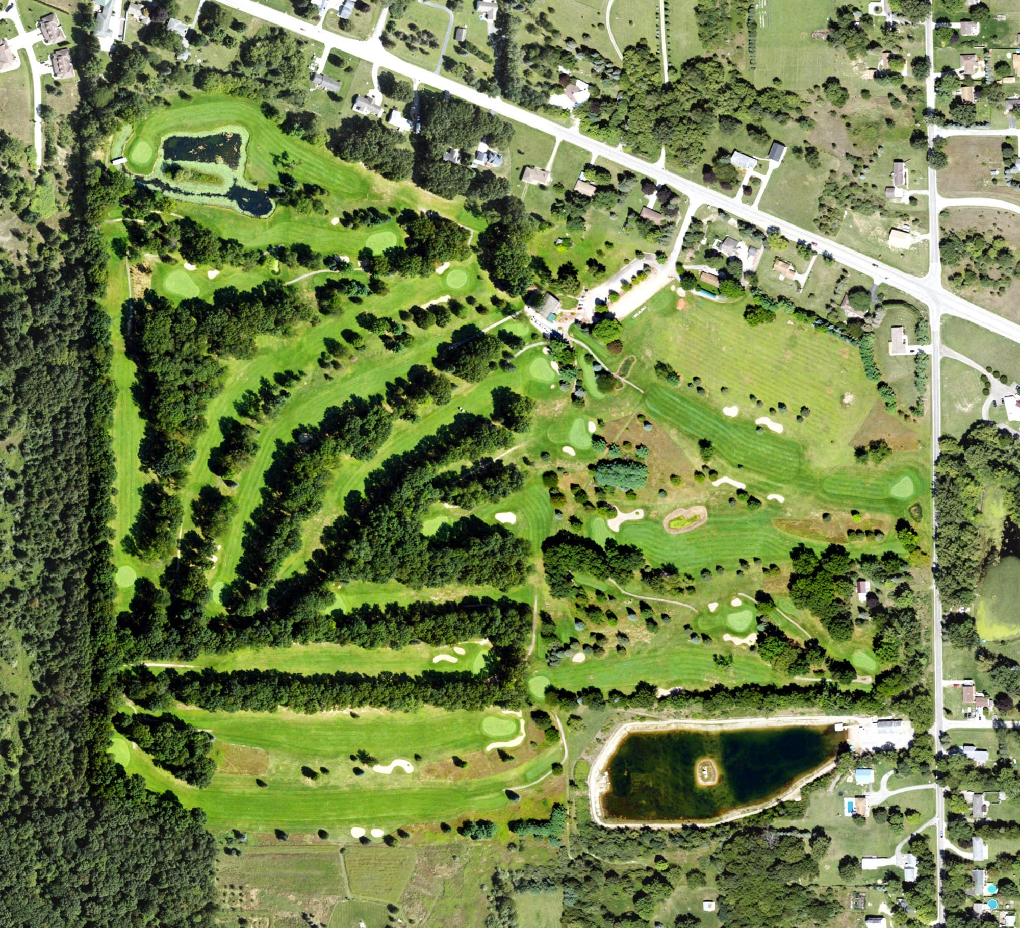 Aerial view of Gauss' Green Valley Golf Course, MI, with its hole routing marked