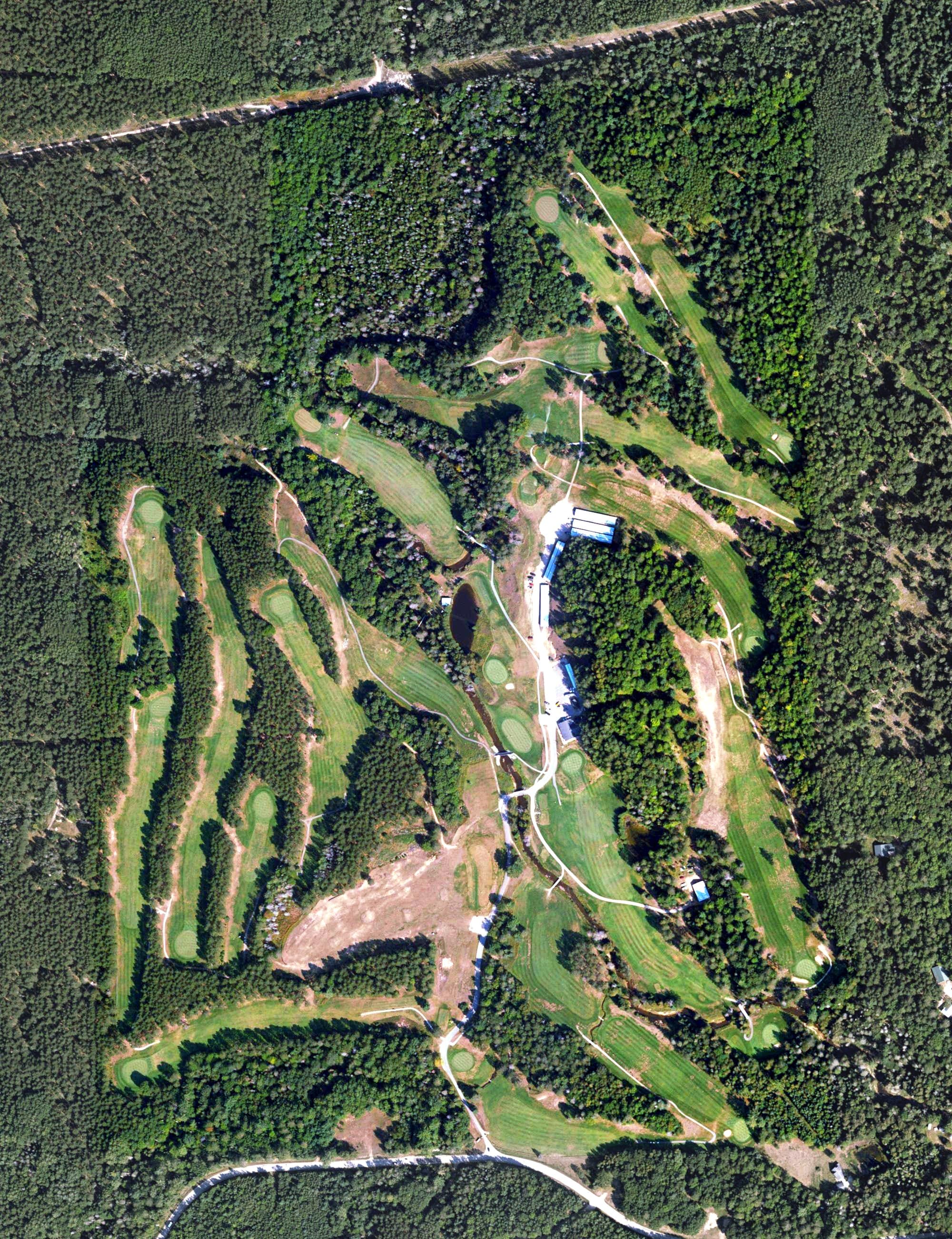 Aerial view of Gladstone Golf Club, MI, with its hole routing marked