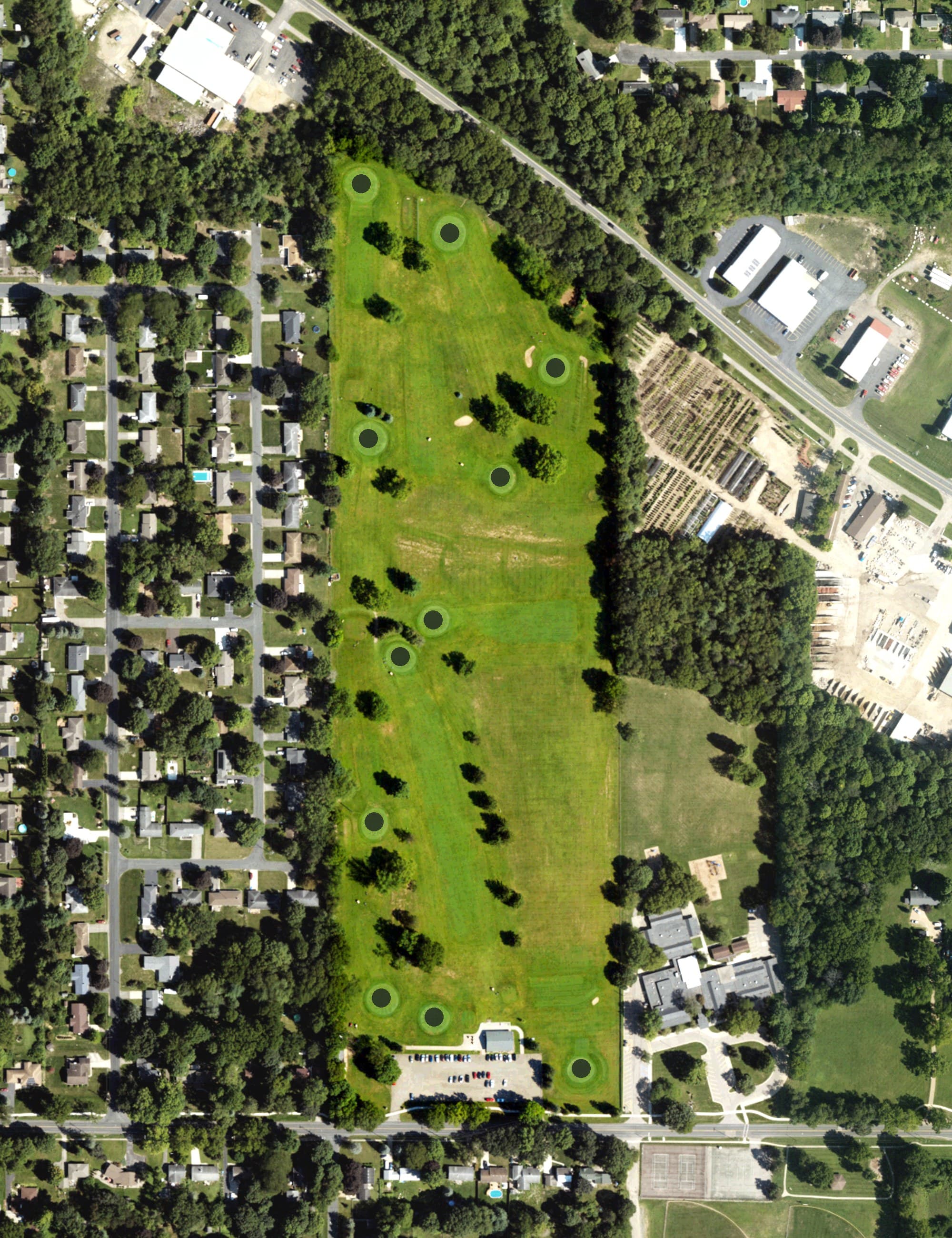 Aerial view of Grand Prarie Golf Course, MI, with its hole routing marked