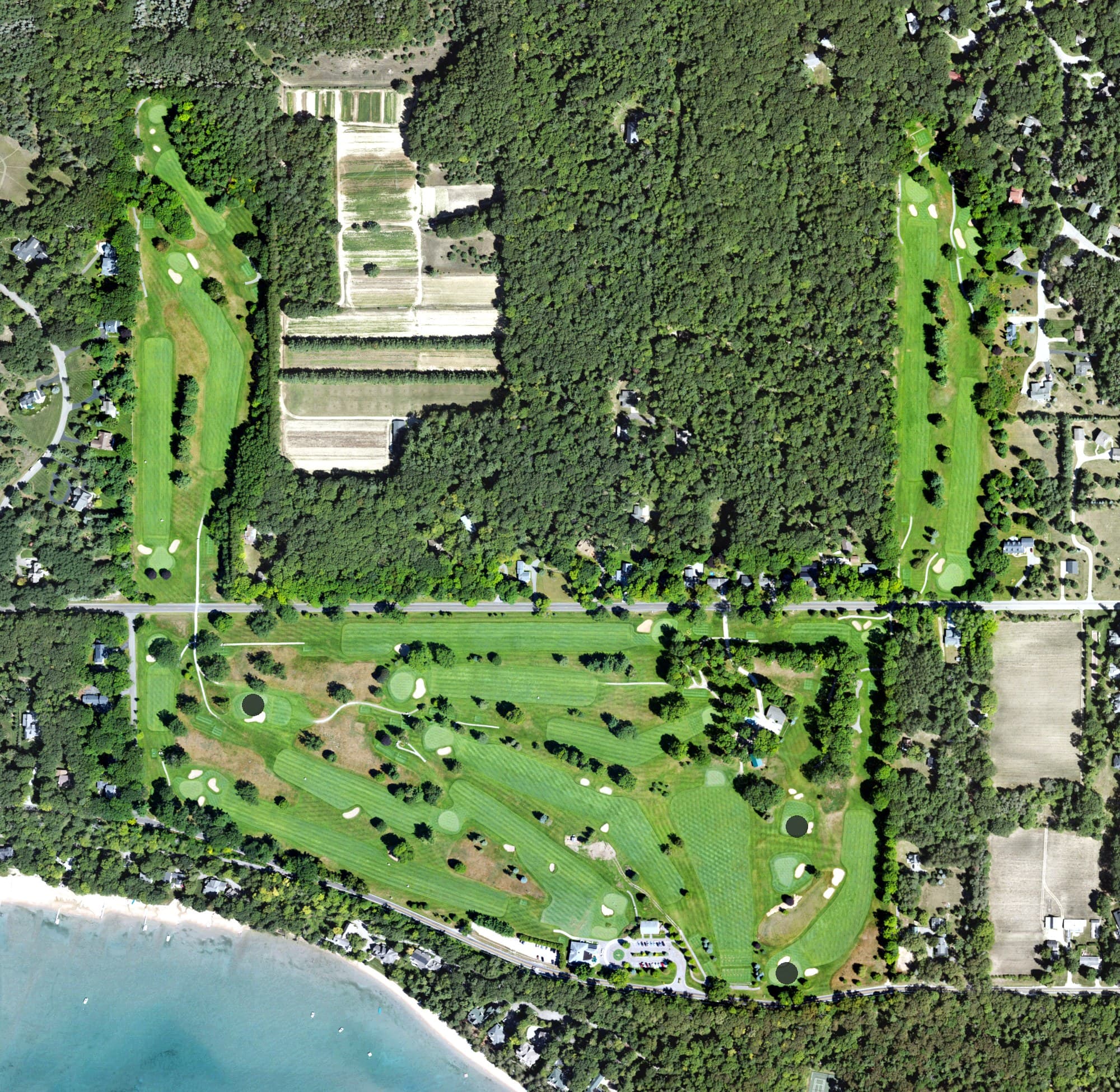 Aerial view of Harbor Point Golf Club, MI, with its hole routing marked