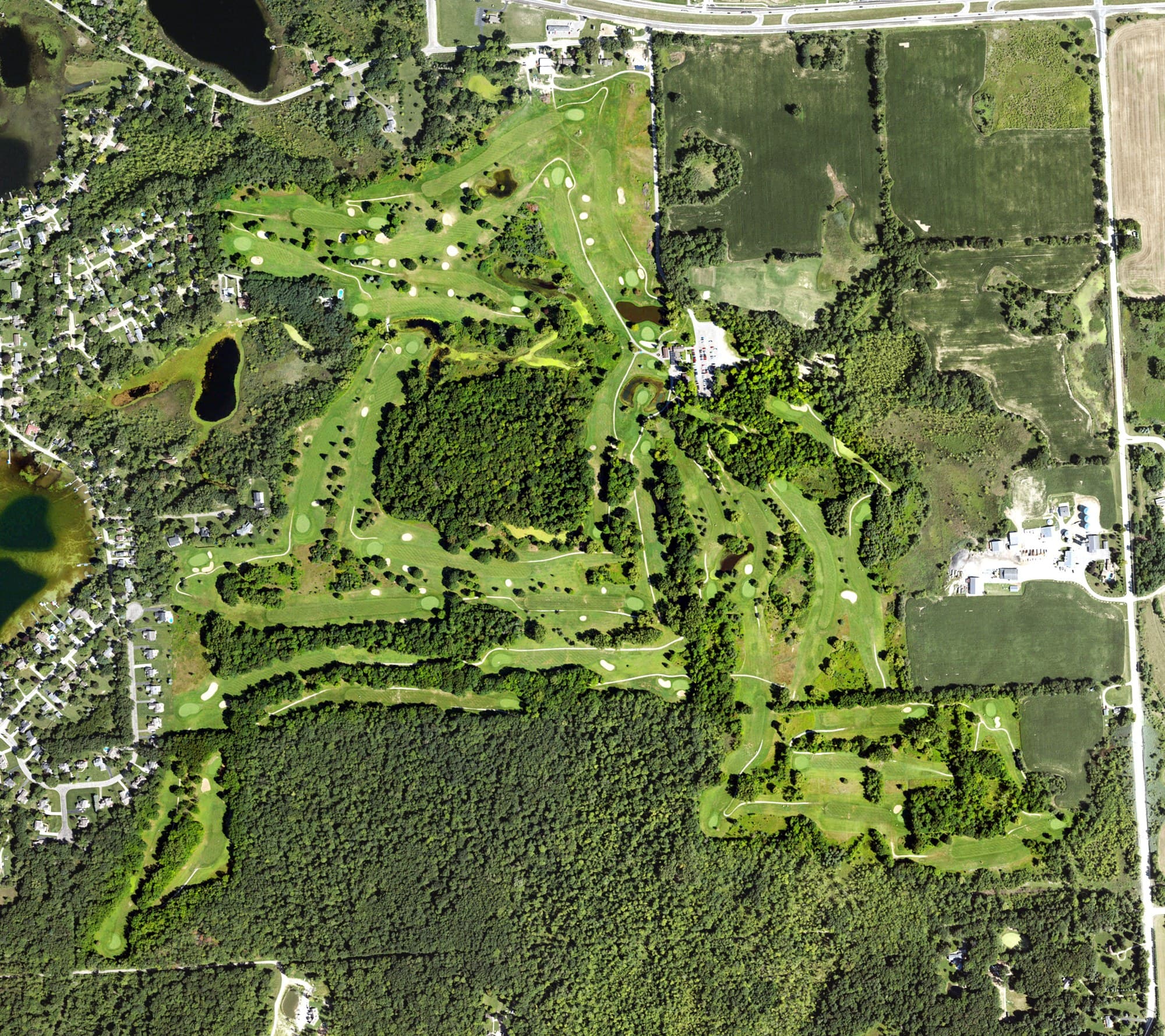 Aerial view of Hartland Glen Golf Club, MI, with its hole routing marked