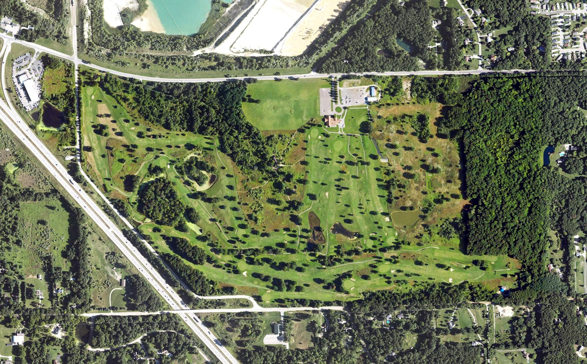 Aerial view of Heather Highlands Golf Club, MI, with its hole routing marked
