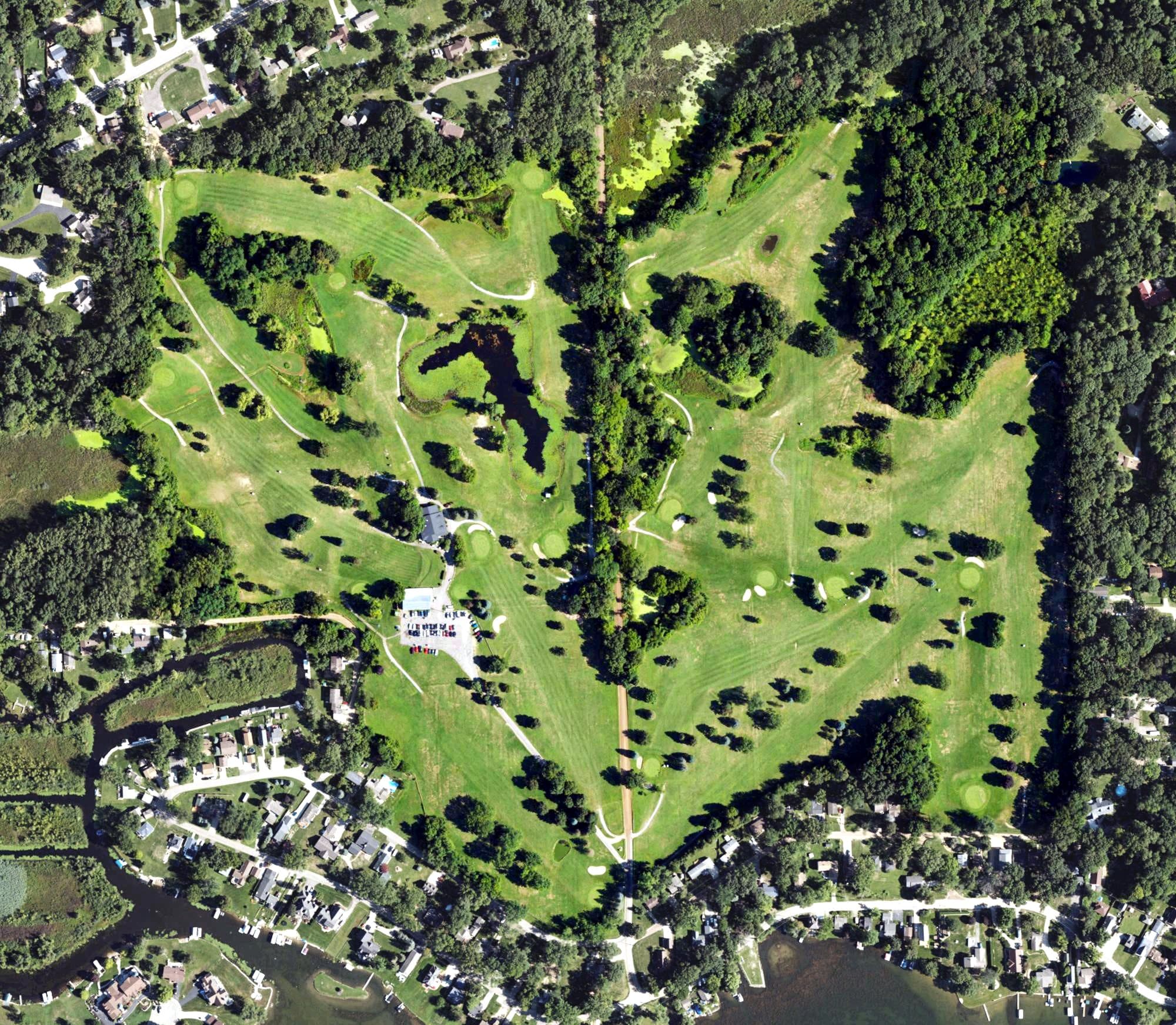 Aerial view of Highland Hills Golf Course, MI, with its hole routing marked