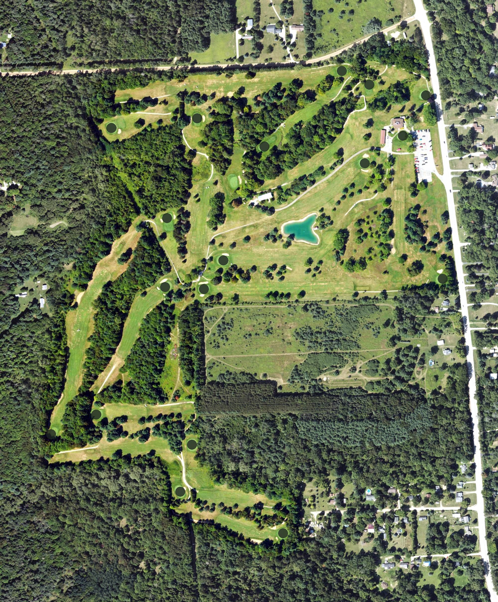 Aerial view of Huron Shores Golf Club & Restaurant, MI, with its hole routing marked