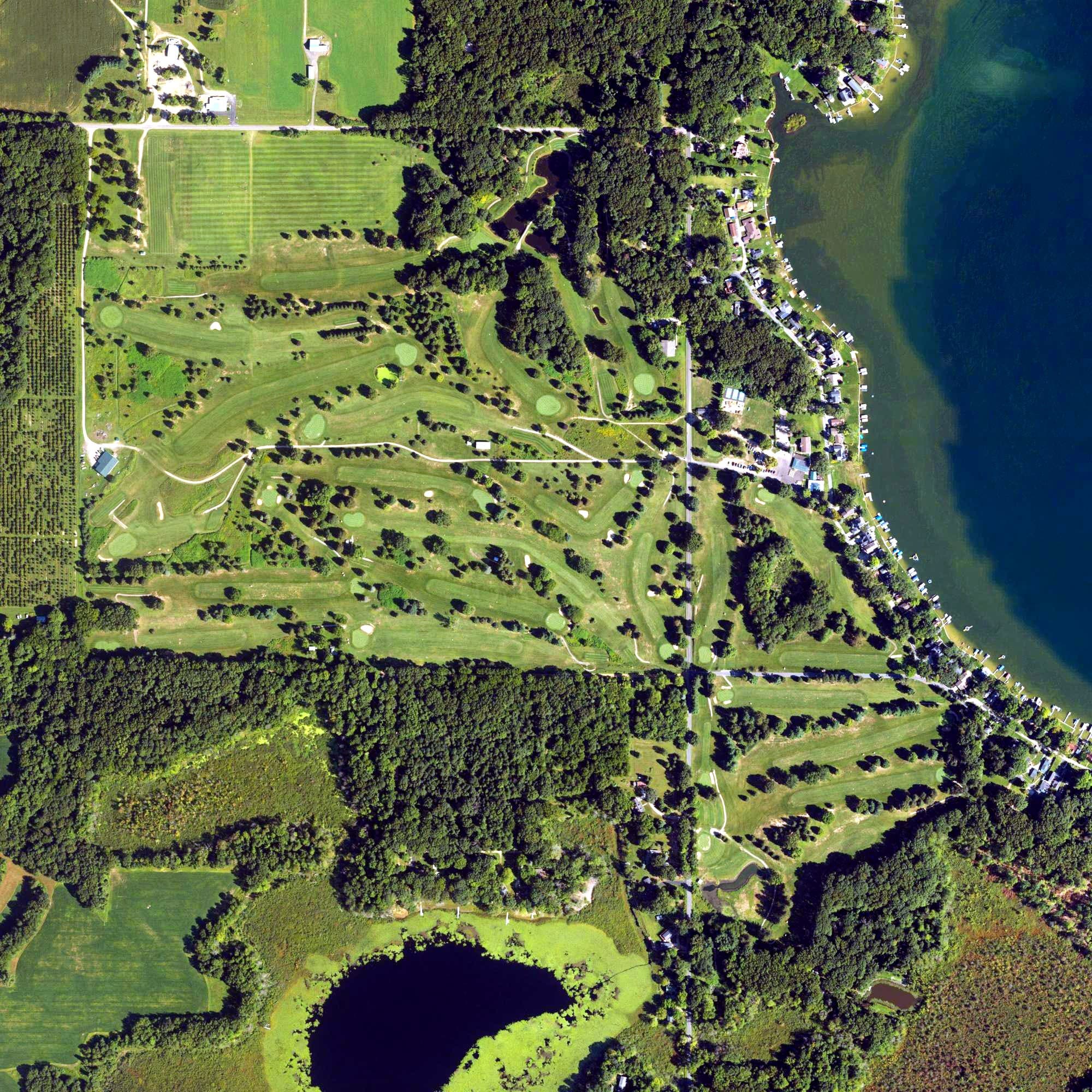 Aerial view of Indian Lake Hills Golf Course, MI, with its hole routing marked