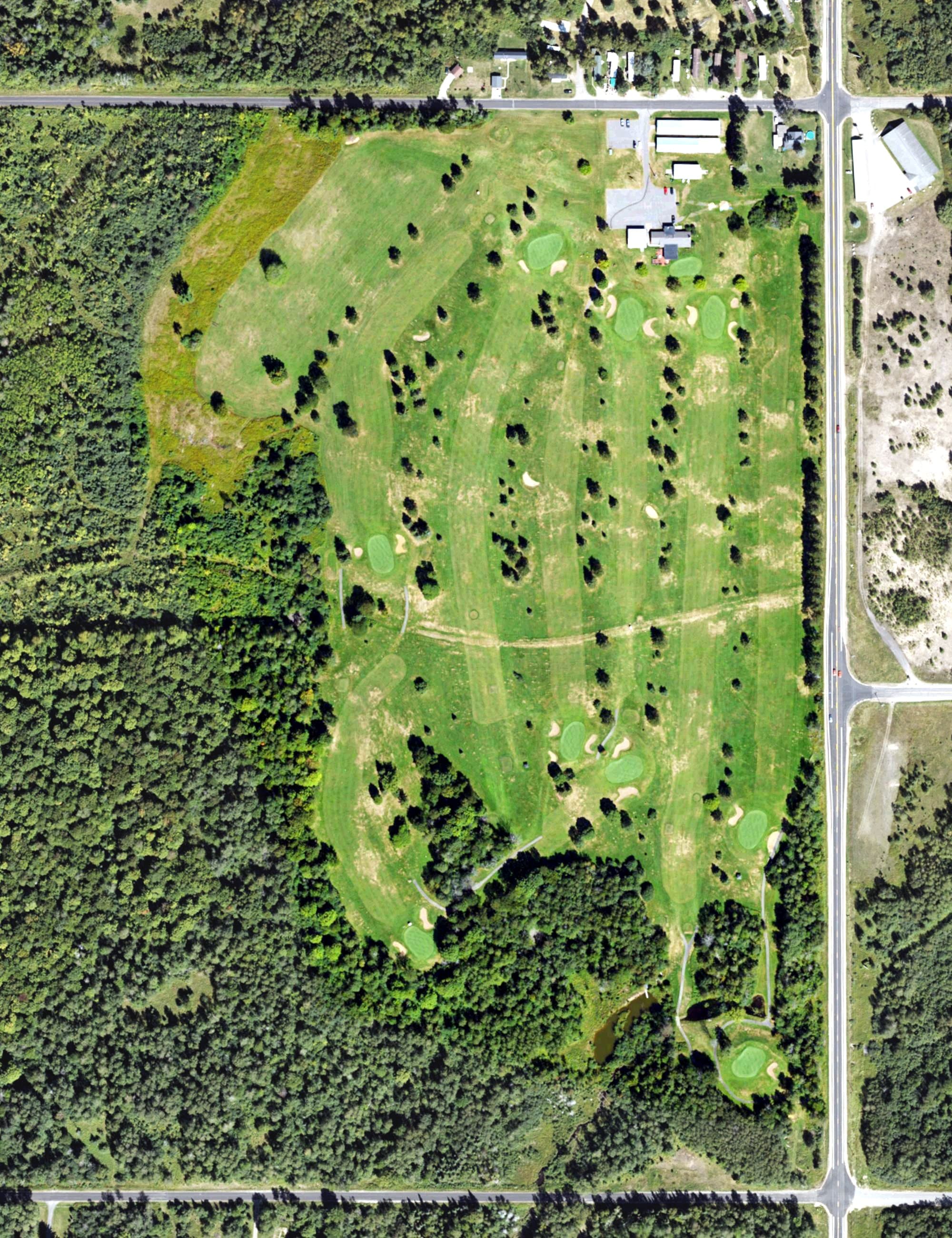 Aerial view of Iron River Country Club, MI, with its hole routing marked