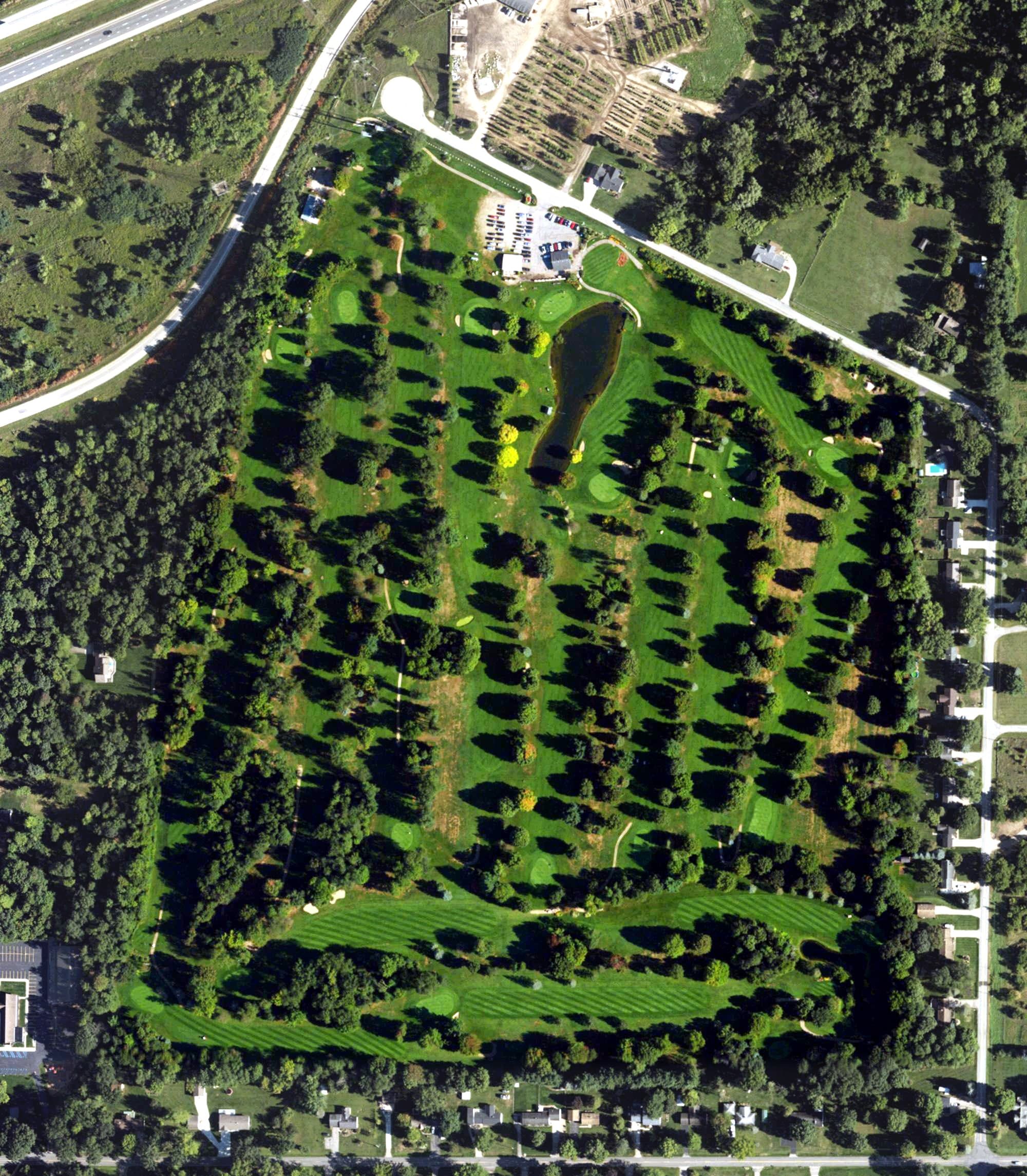 Aerial view of Ironwood Golf Course, MI, with its hole routing marked