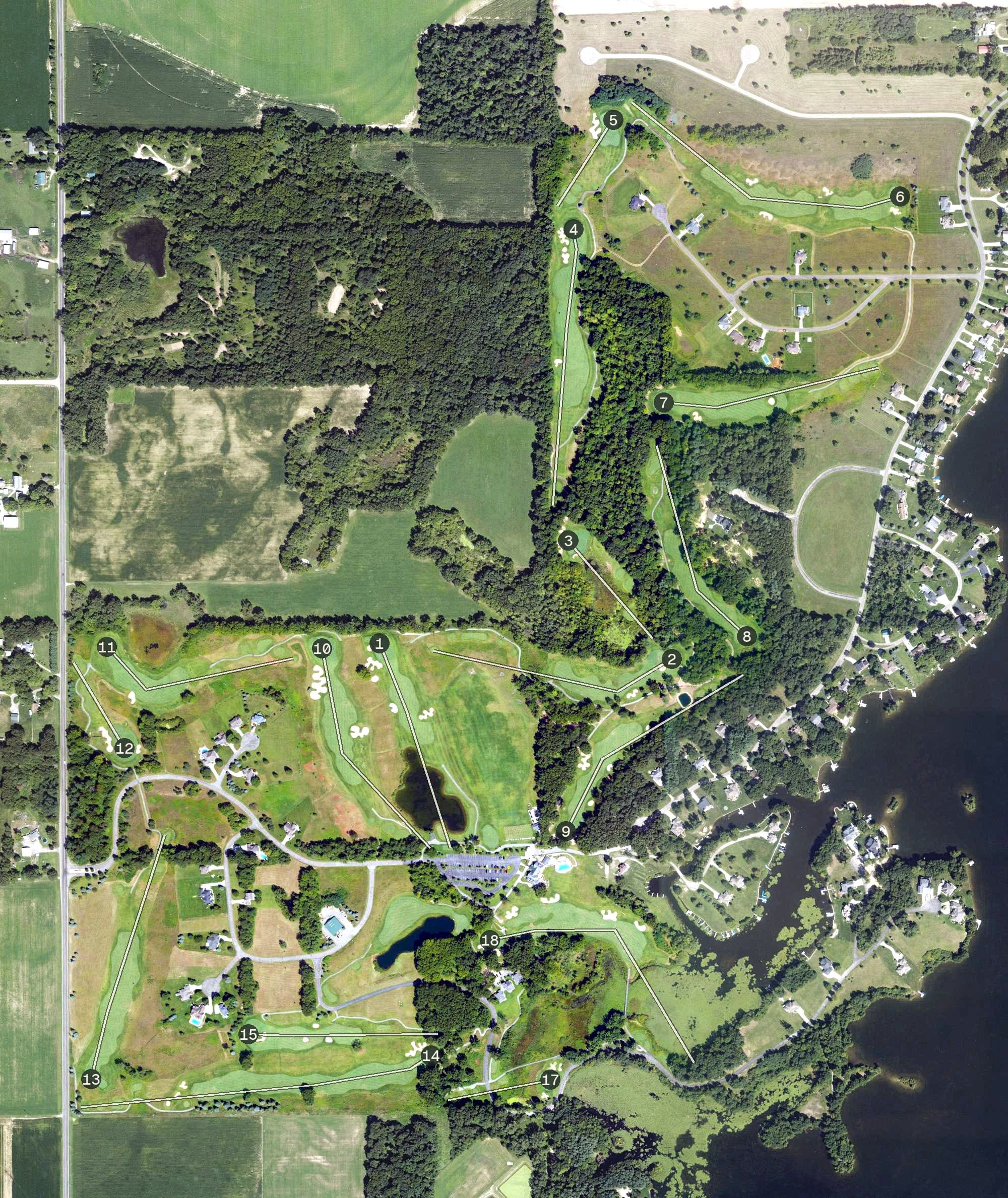 Aerial view of Island Hills Golf Club, MI, with its hole routing marked