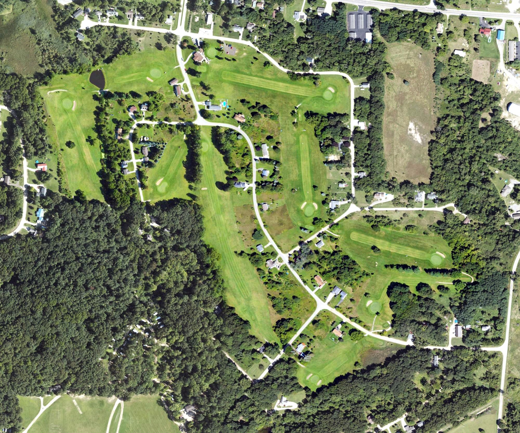 Aerial view of Lake Leann Golf Course, MI, with its hole routing marked