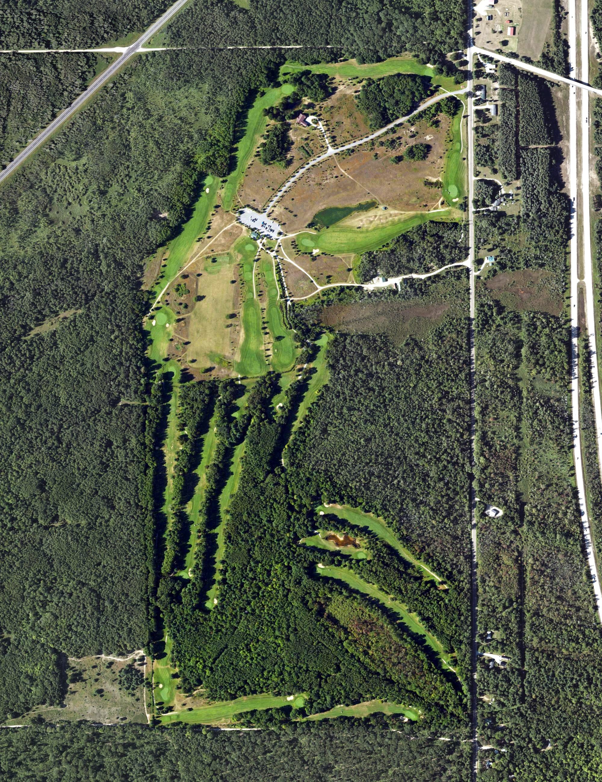 Aerial view of Mackinaw Club, MI, with its hole routing marked