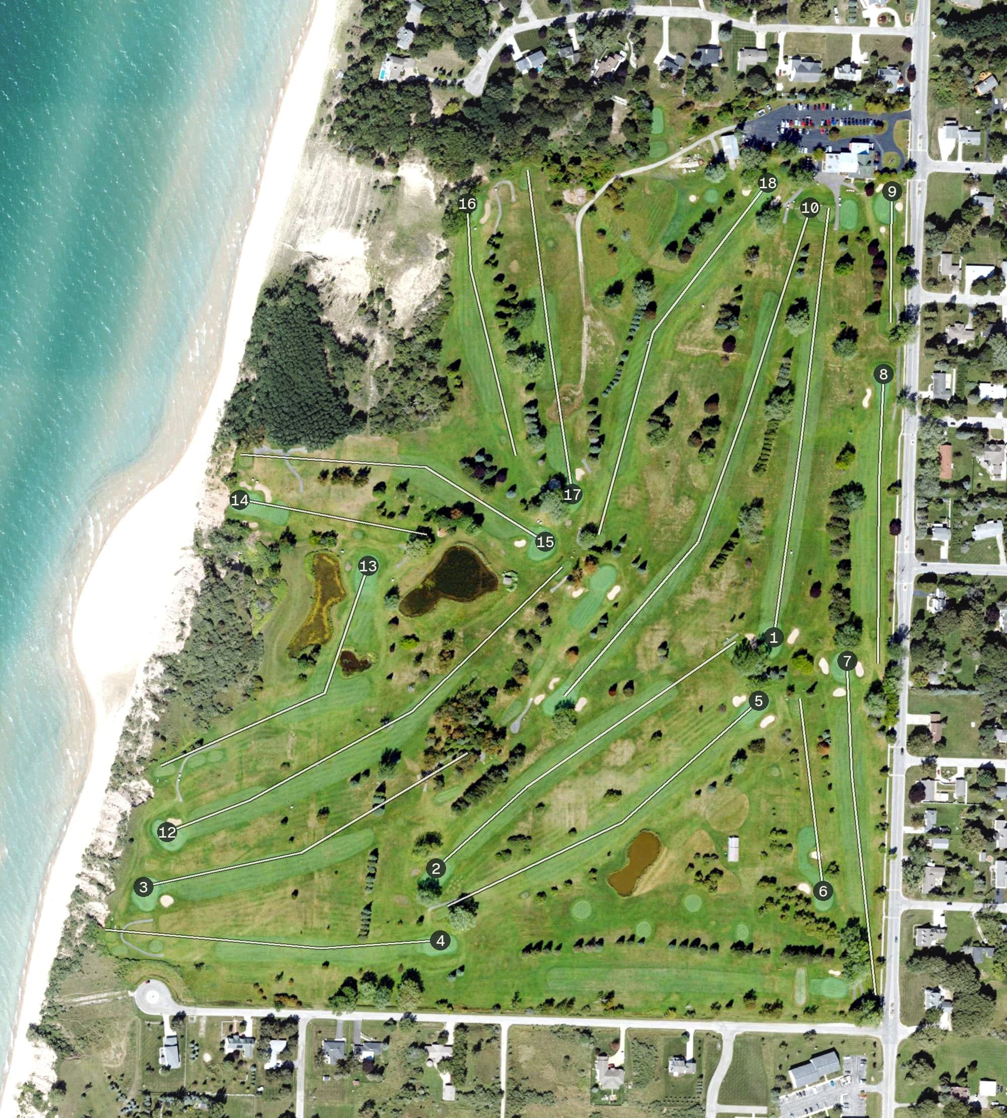 Aerial view of Manistee Golf & Country Club, MI, with its hole routing marked