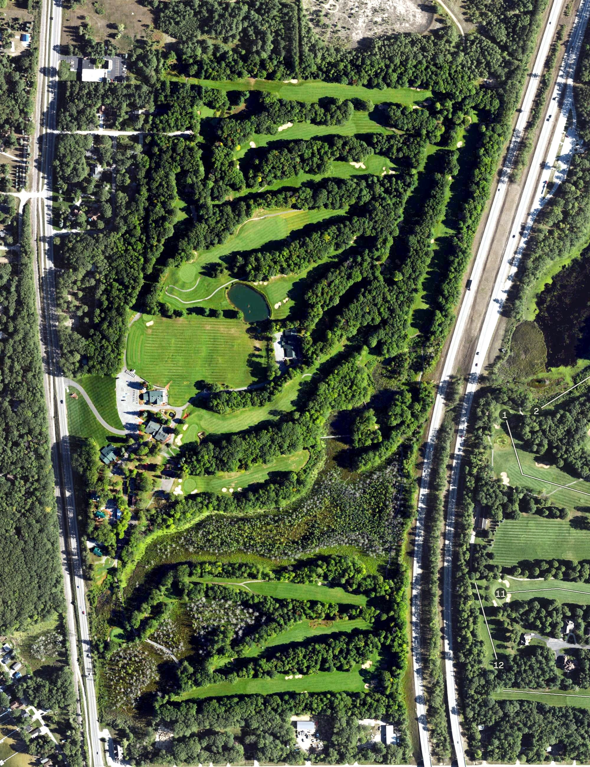 Aerial view of Marsh Ridge Golf Course and Resort, MI, with its hole routing marked