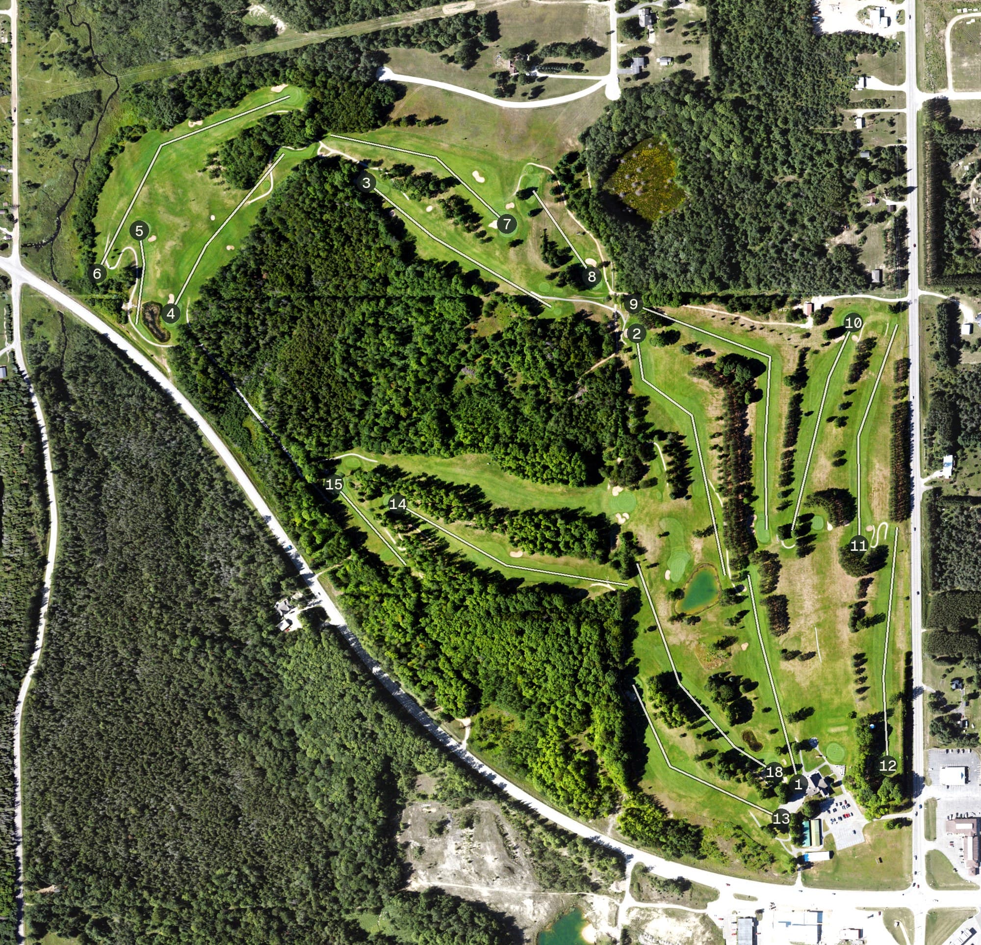 Aerial view of Newberry Country Club, MI, with its hole routing marked