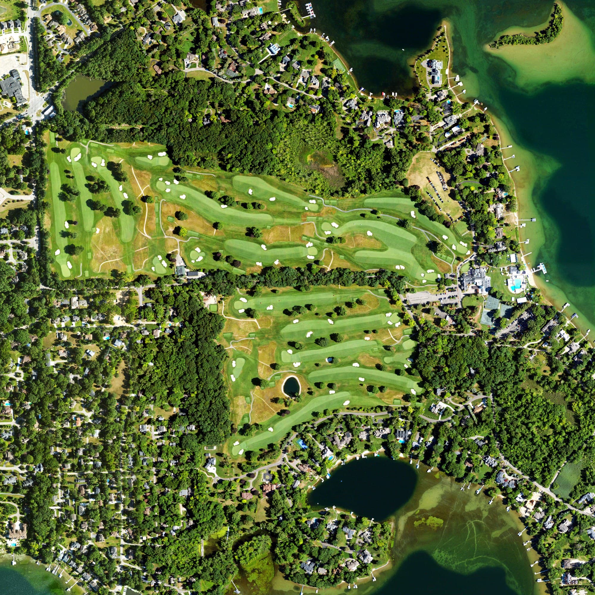 Aerial view of Orchard Lake Country Club, MI, with its hole routing marked