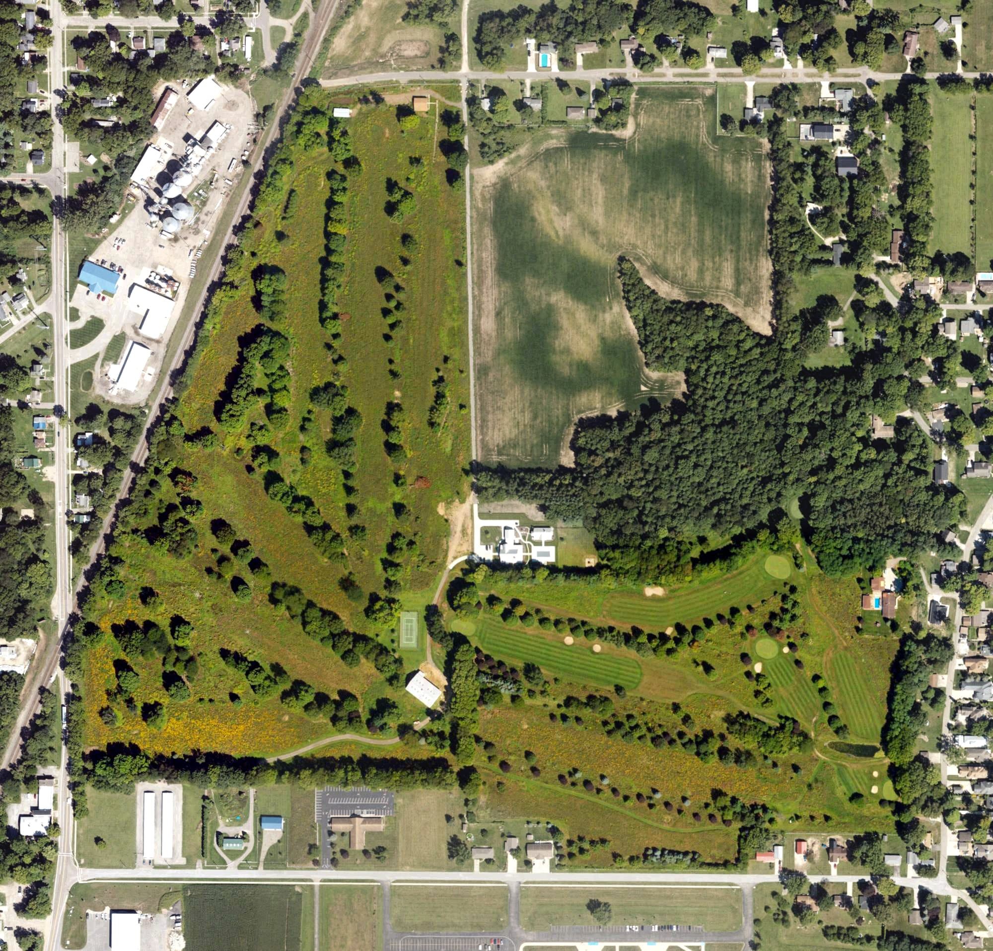 Aerial view of Park Shore Golf Course, MI, with its hole routing marked