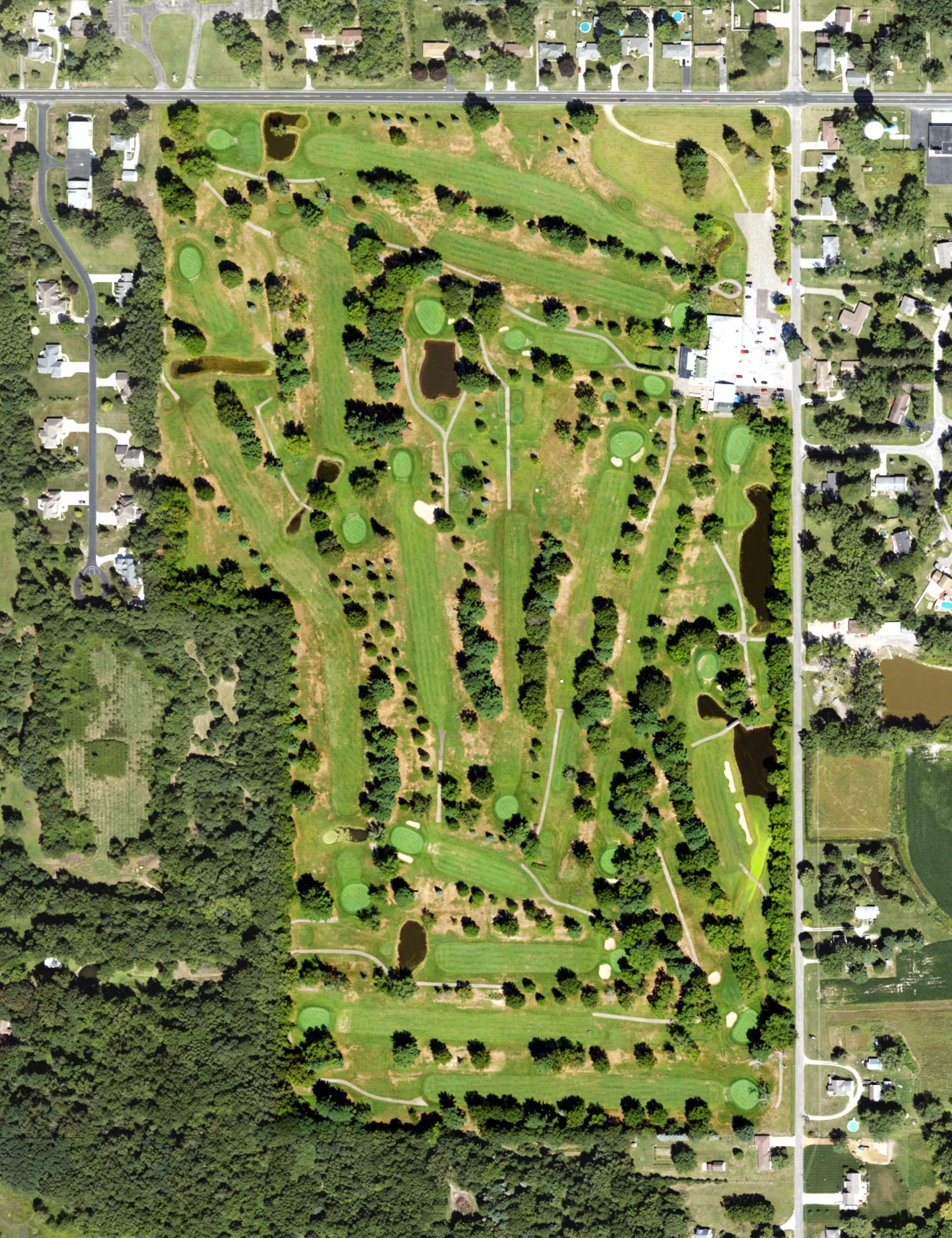 Aerial view of Pebblewood Golf Course, MI, with its hole routing marked