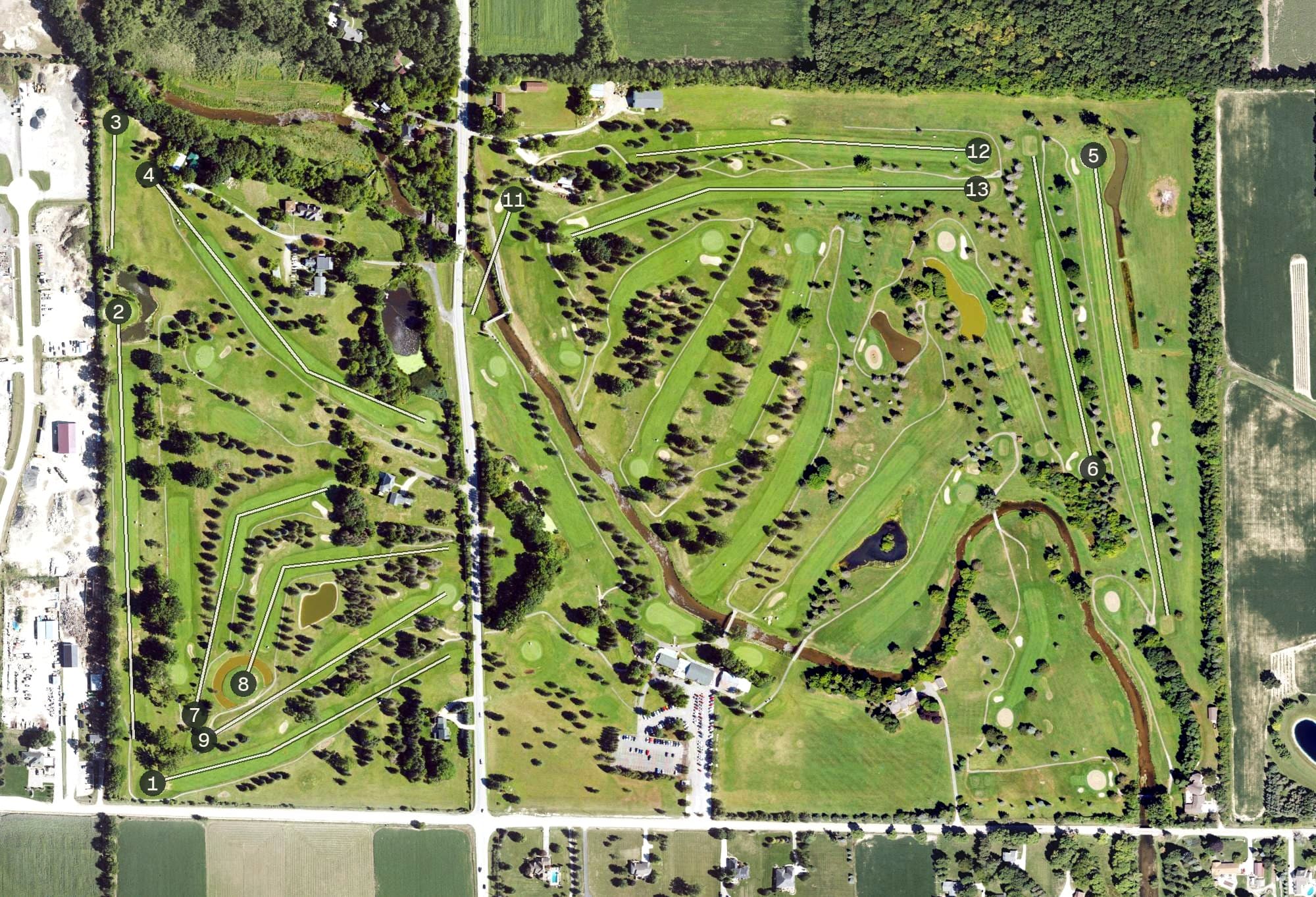 Aerial view of Pine Valley Golf & Country Club, MI, with its hole routing marked