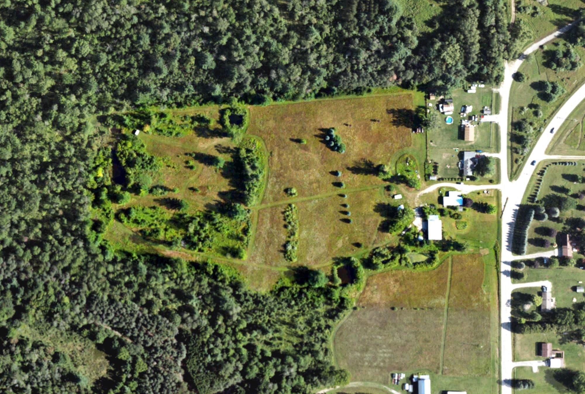 Aerial view of Rifle River Golf Course, MI, with its hole routing marked