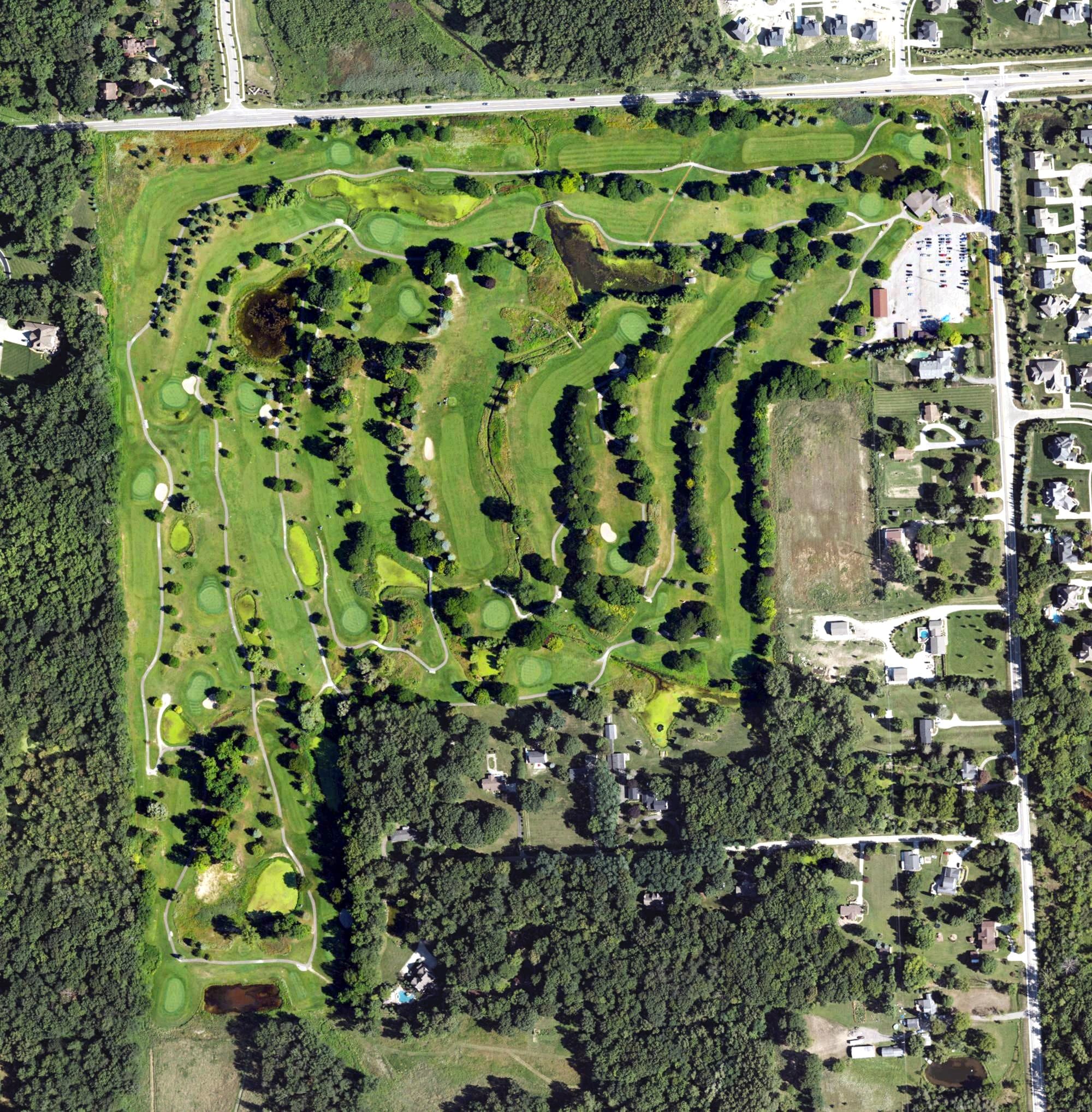 Aerial view of River Bank Golf Course, MI, with its hole routing marked