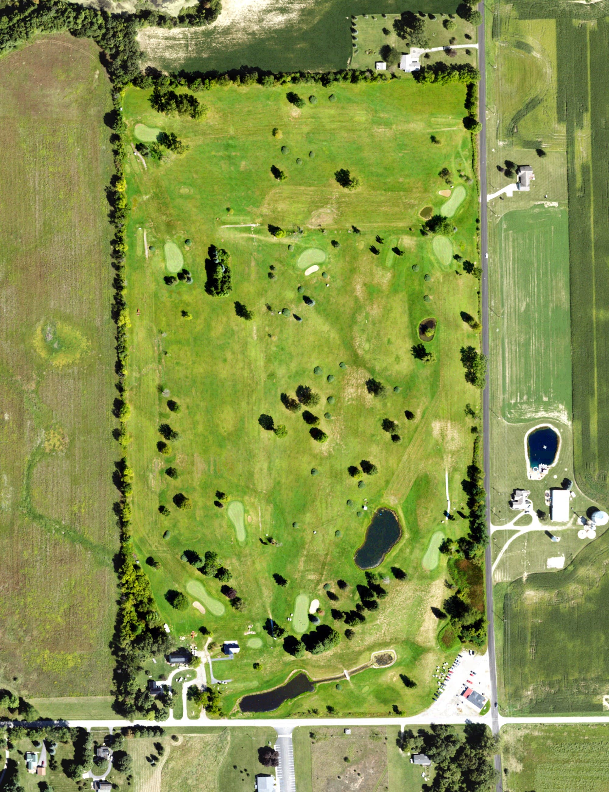 Aerial view of Shaffer's Evergreen Golf Course, MI, with its hole routing marked
