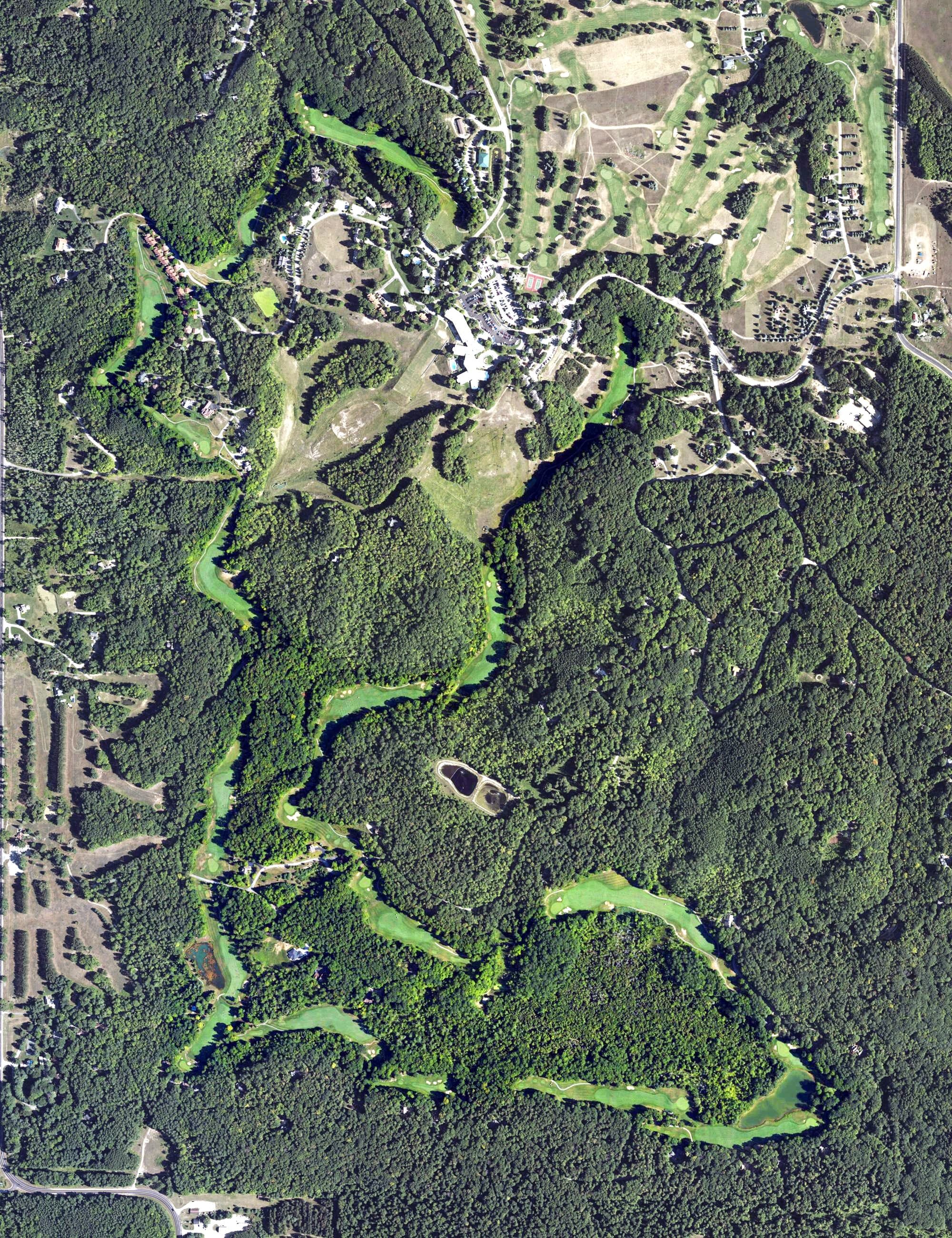 Aerial view of The Legend Golf Course, MI, with its hole routing marked