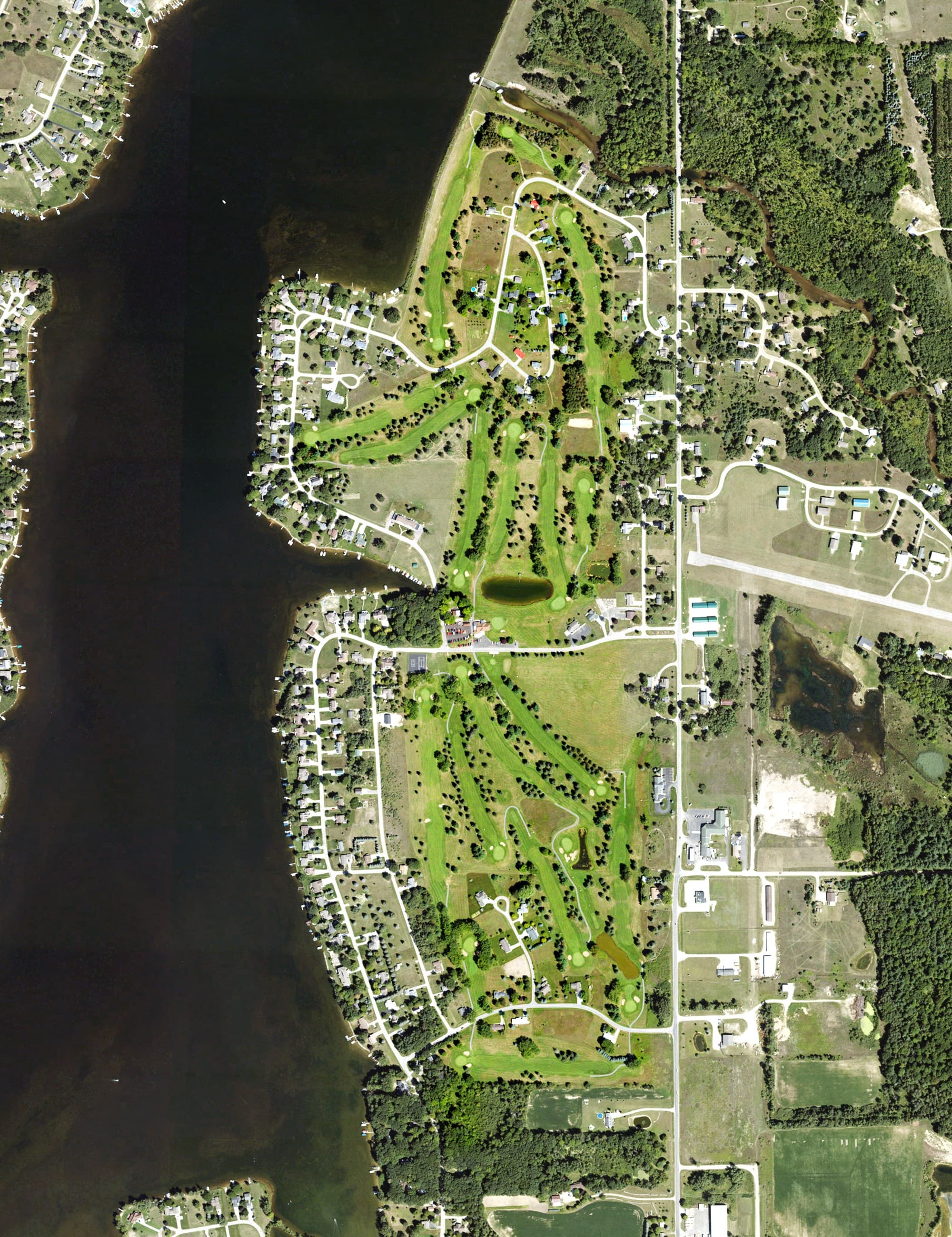 Aerial view of The Pines Golf Course, MI, with its hole routing marked