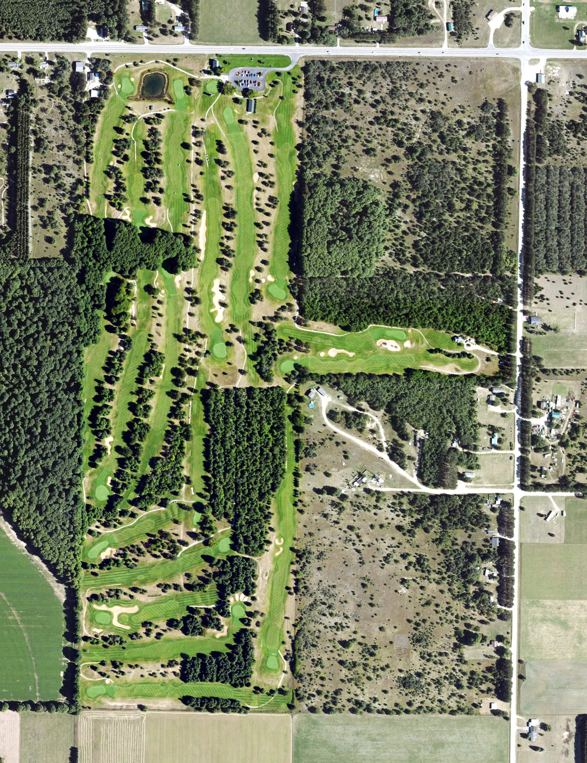 Aerial view of Timber Wolf Golf Club, MI, with its hole routing marked