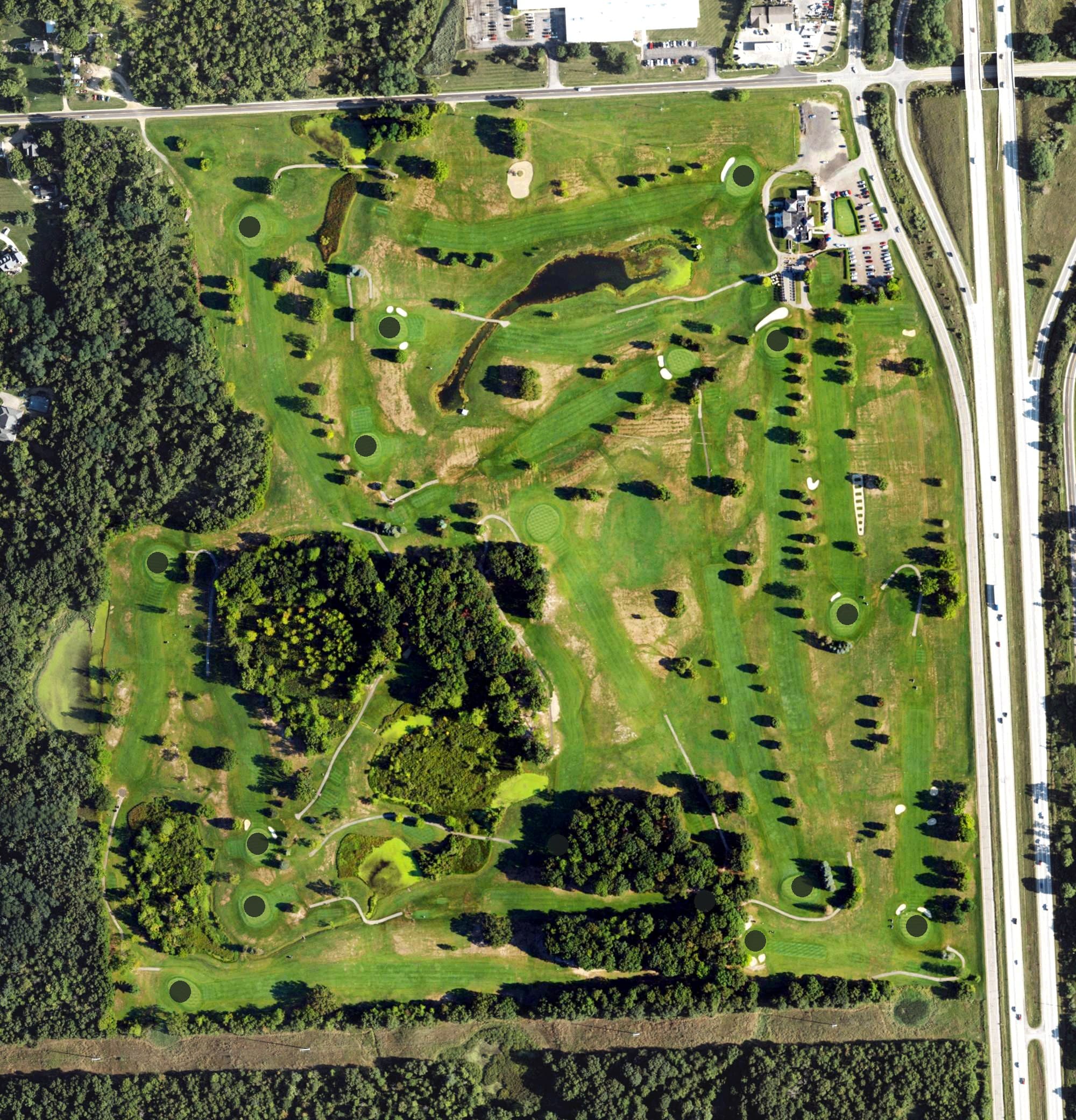 Aerial view of Tyrone Hills Golf Club, MI, with its hole routing marked