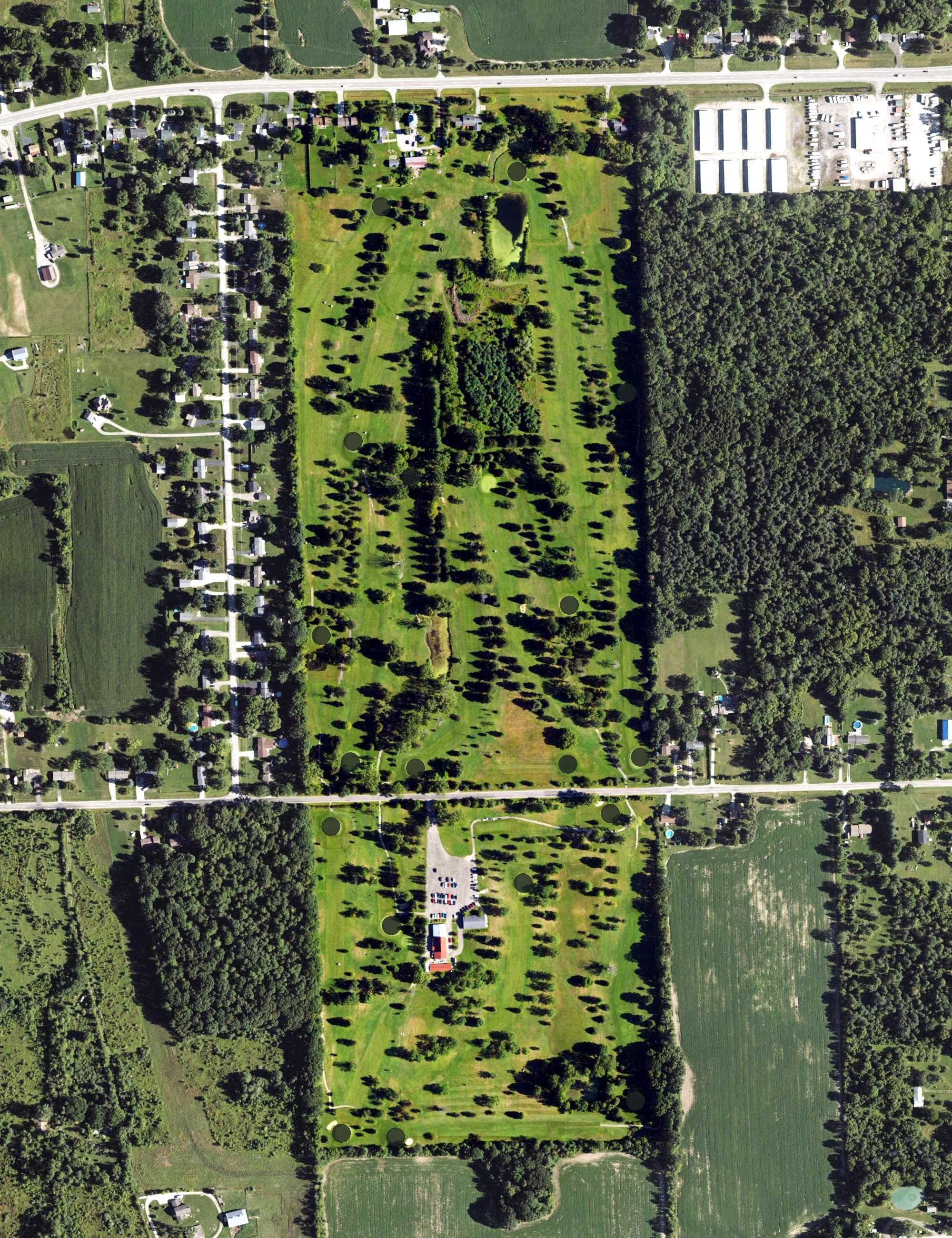 Aerial view of Vienna Greens Country Club, MI, with its hole routing marked