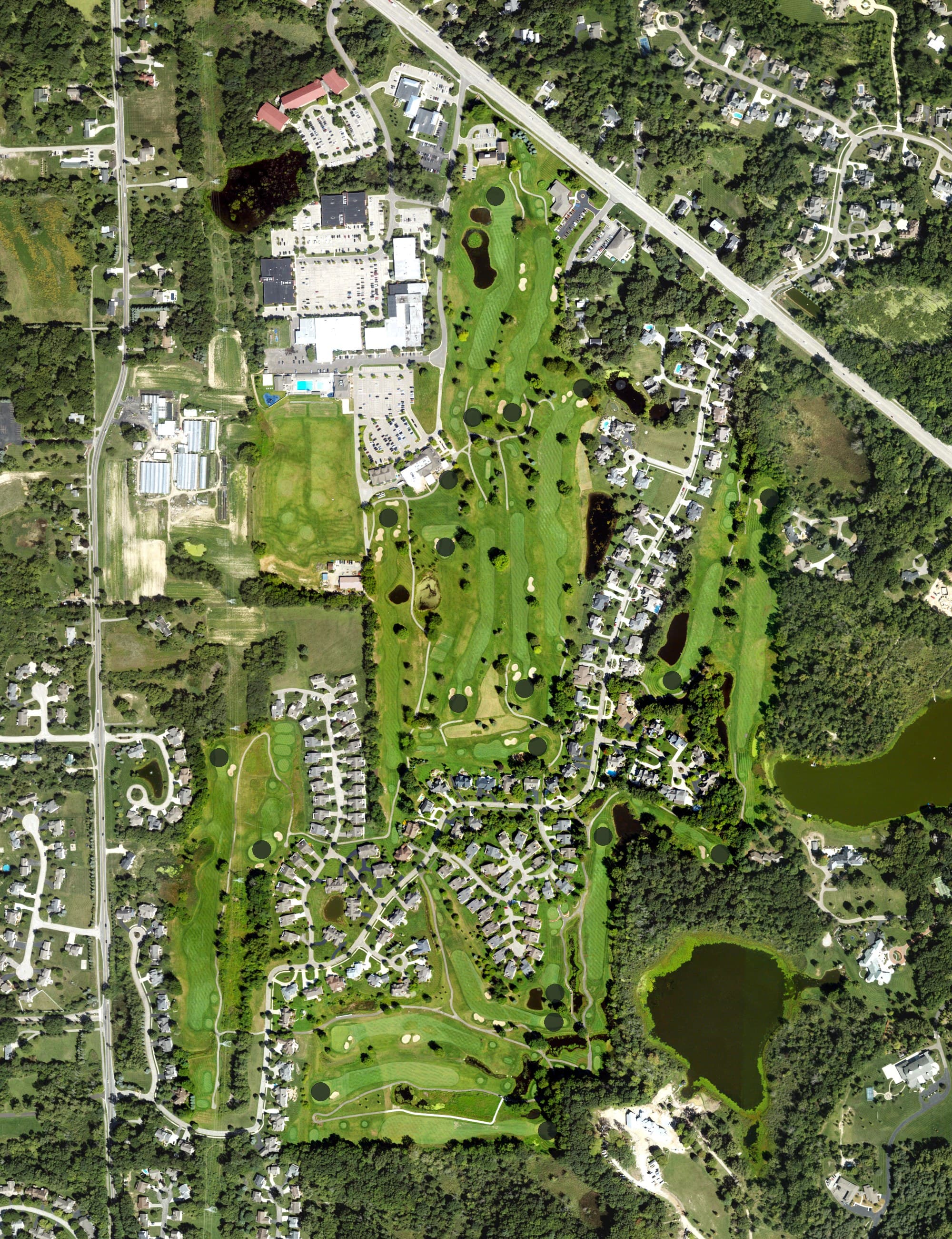 Aerial view of Watermark Country Club, MI, with its hole routing marked