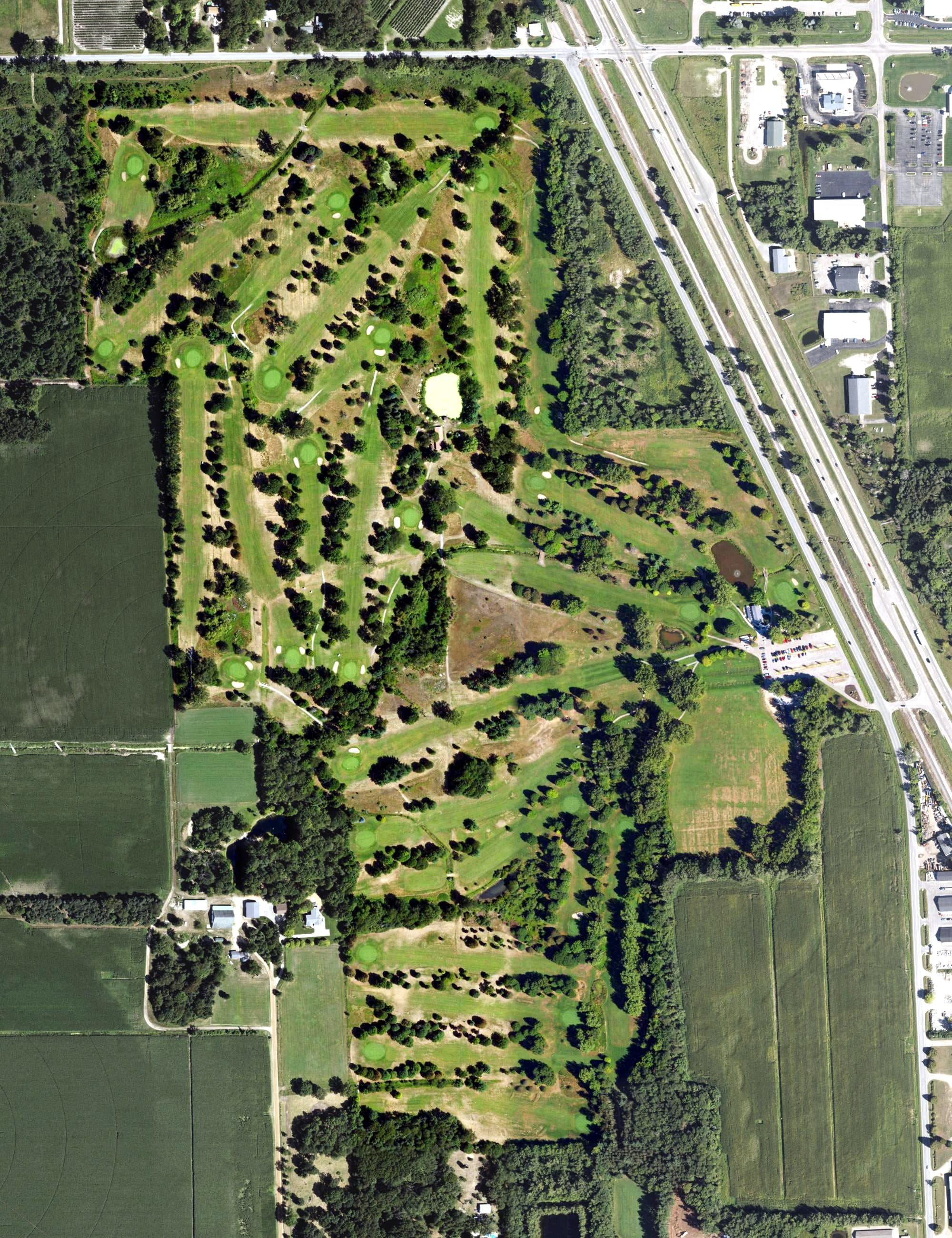 Aerial view of West Ottawa Golf Course, MI, with its hole routing marked