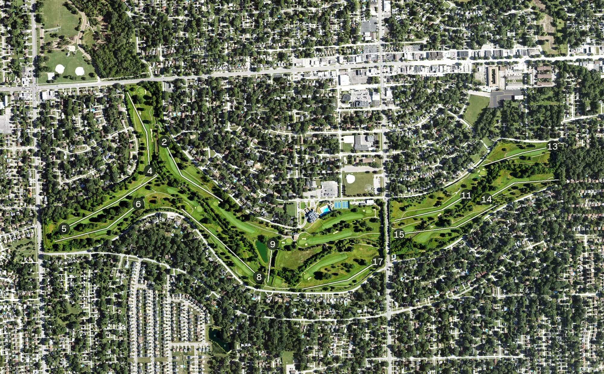 Aerial view of Western Golf and Country Club, MI, with its hole routing marked