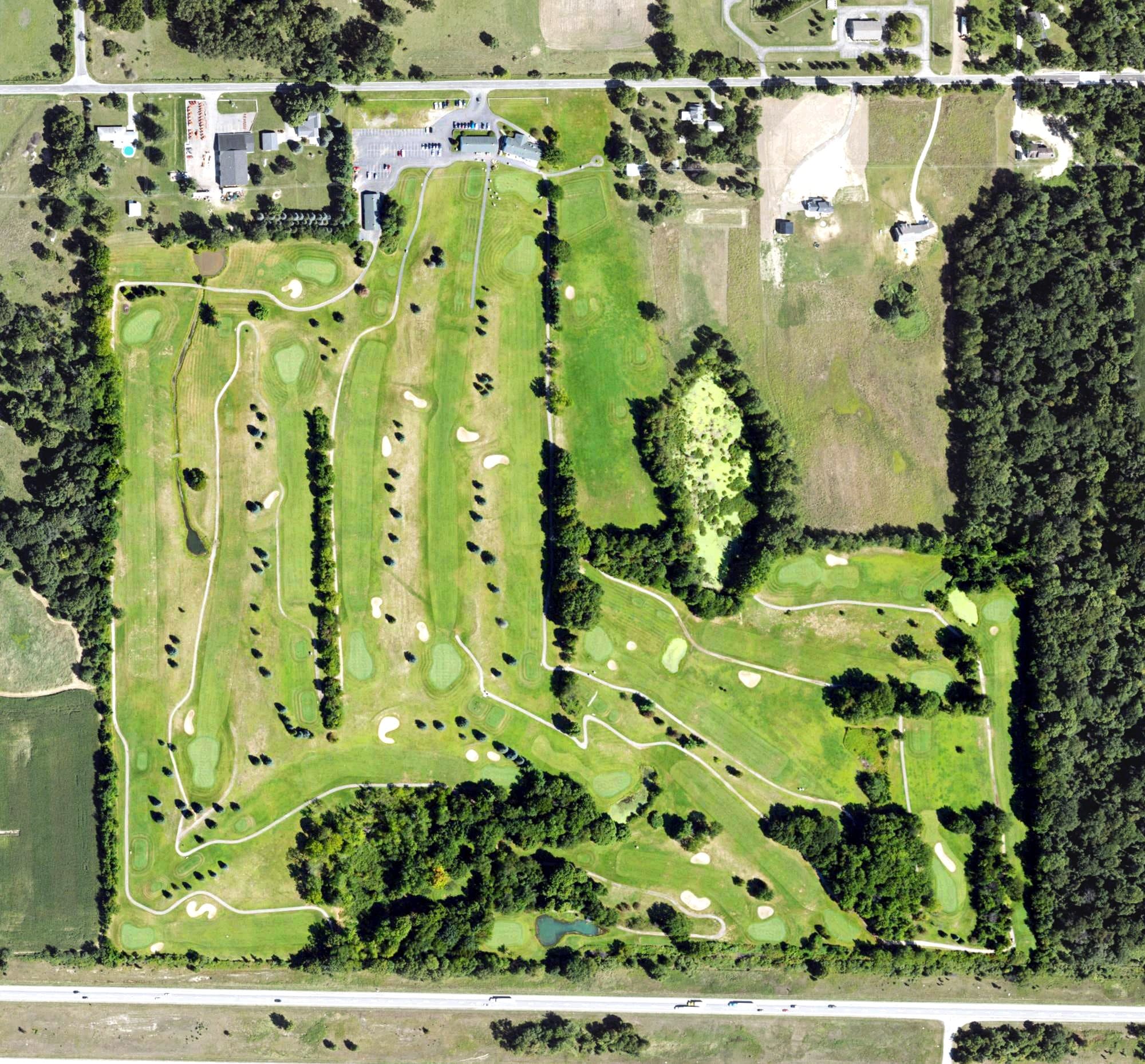 Aerial view of Wheatfield Valley Golf Course, MI, with its hole routing marked
