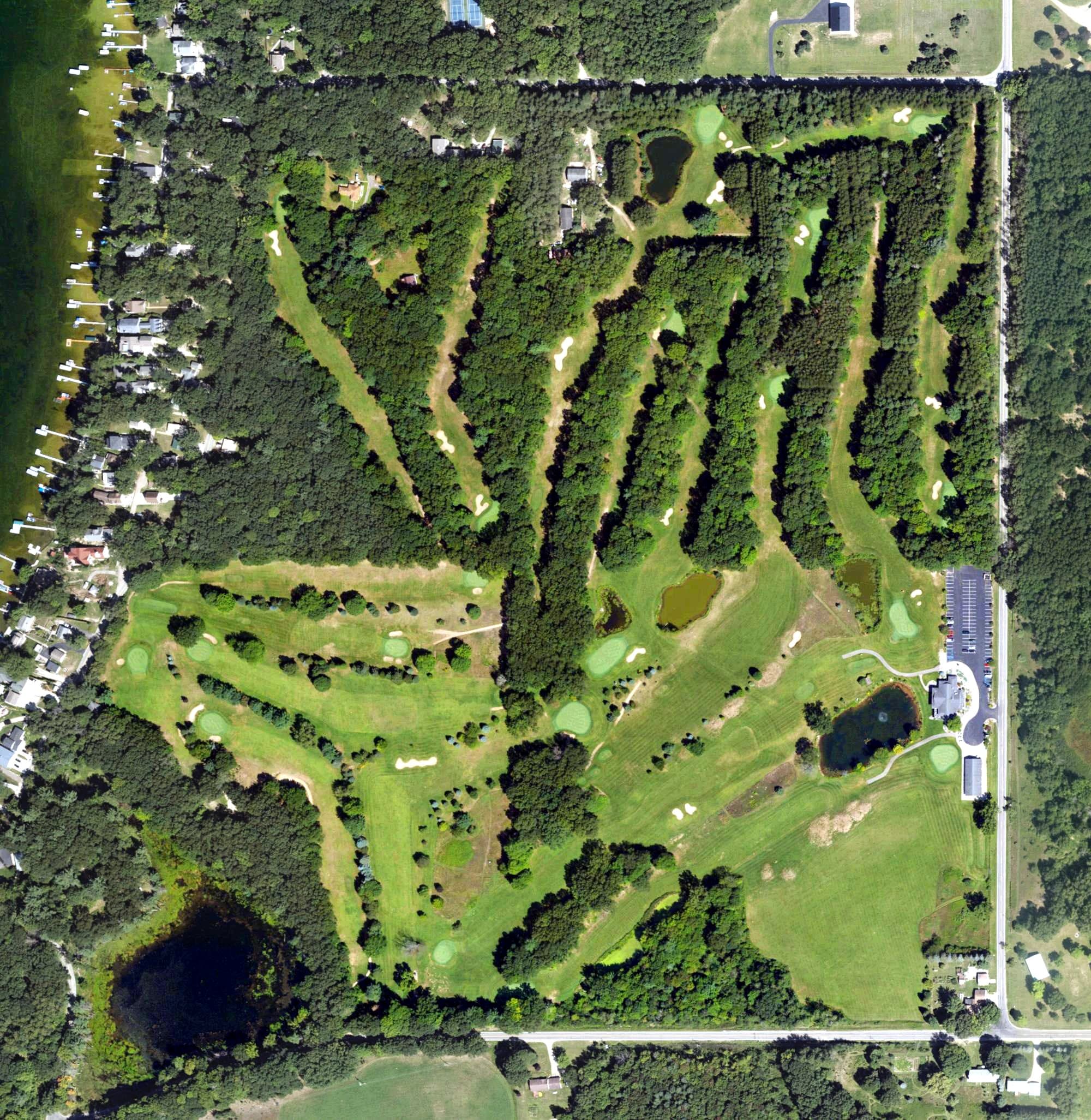 Aerial view of Whitefish Lake Golf Club, MI, with its hole routing marked