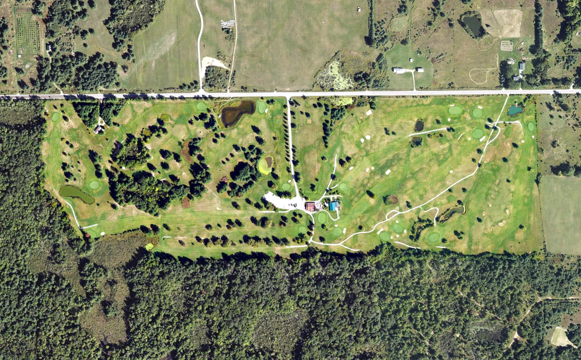 Aerial view of Wicker Hills Golf Club, MI, with its hole routing marked