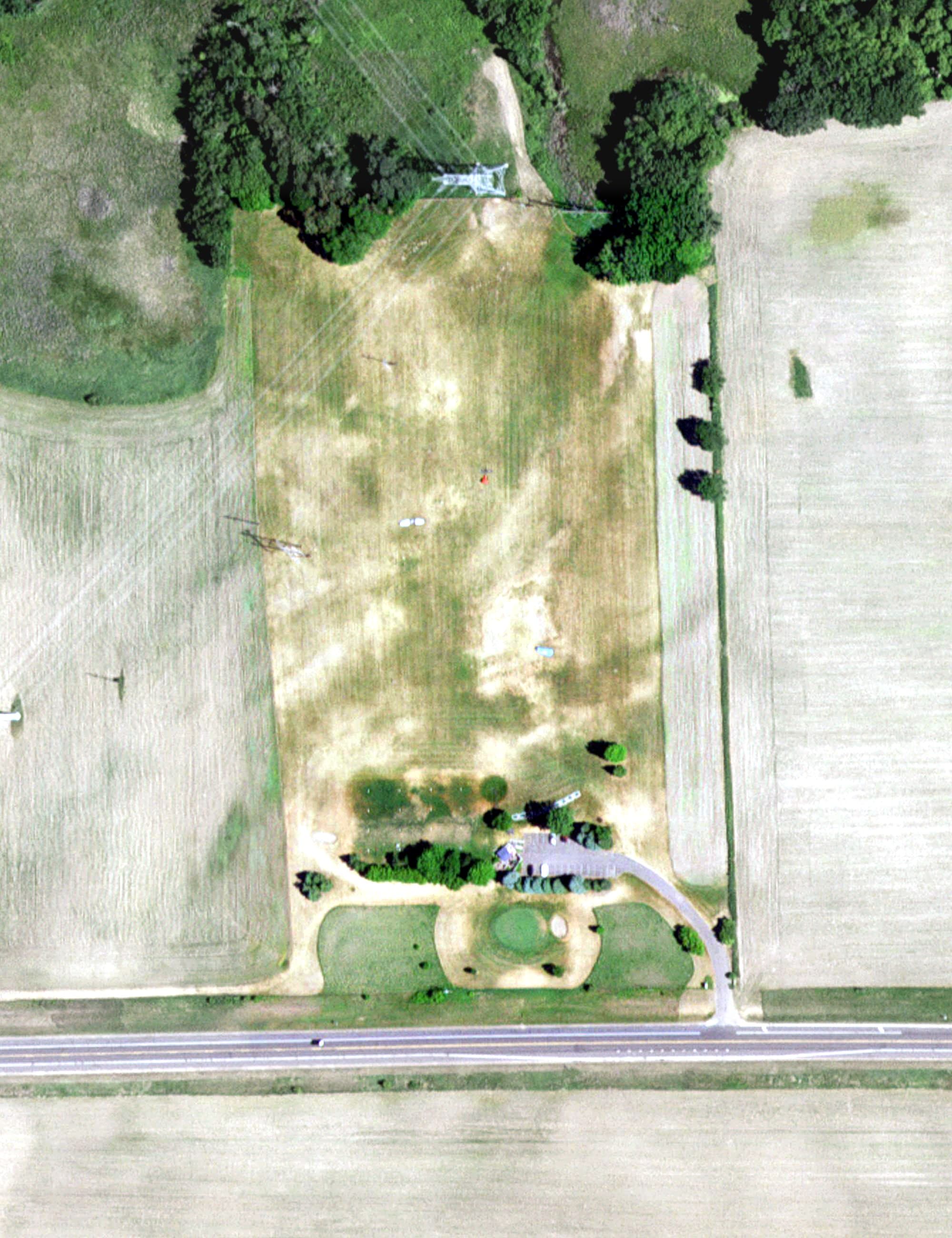 Aerial view of Ironwood Golf Range, MN, with its hole routing marked