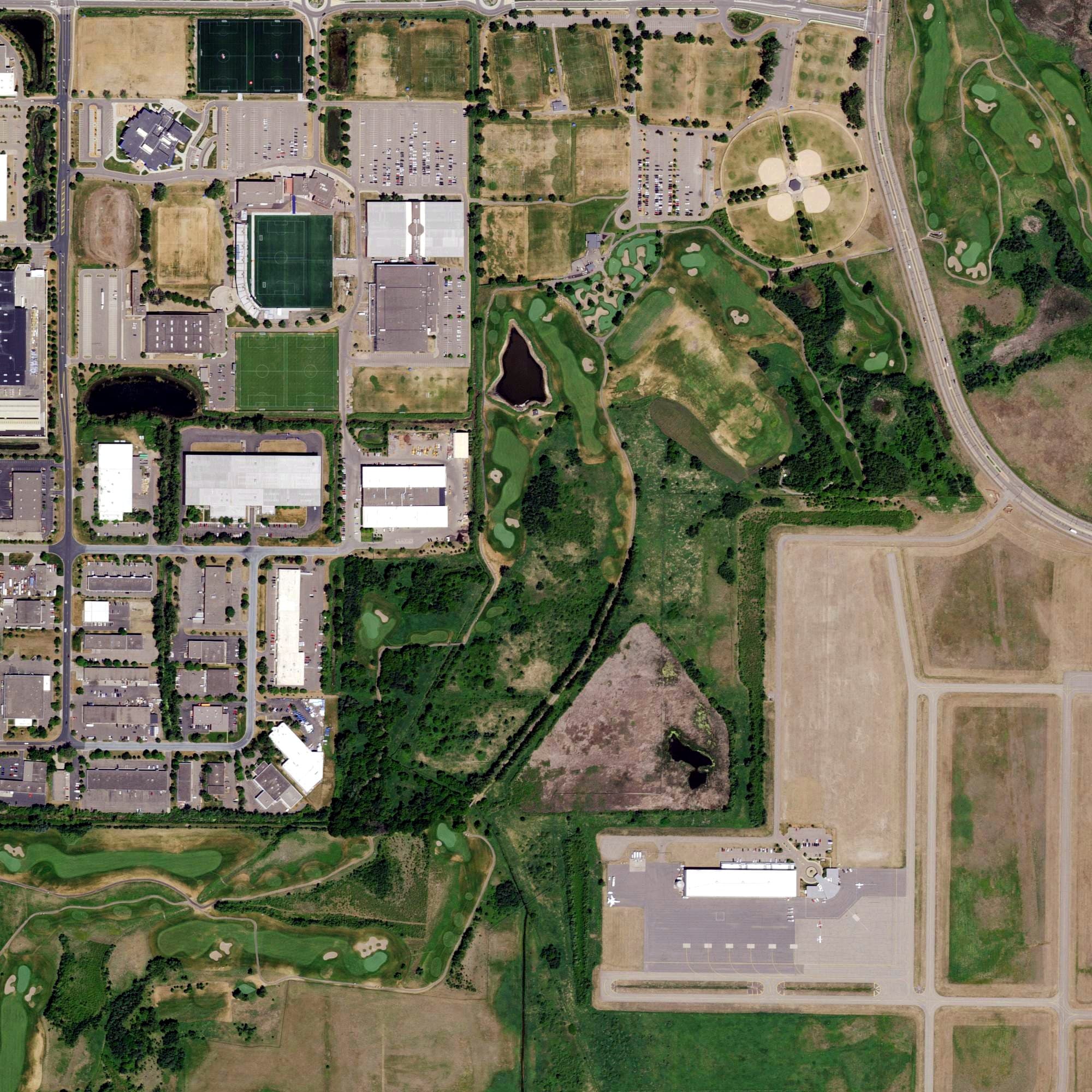Aerial view of Victory Links Golf Course, MN, with its hole routing marked