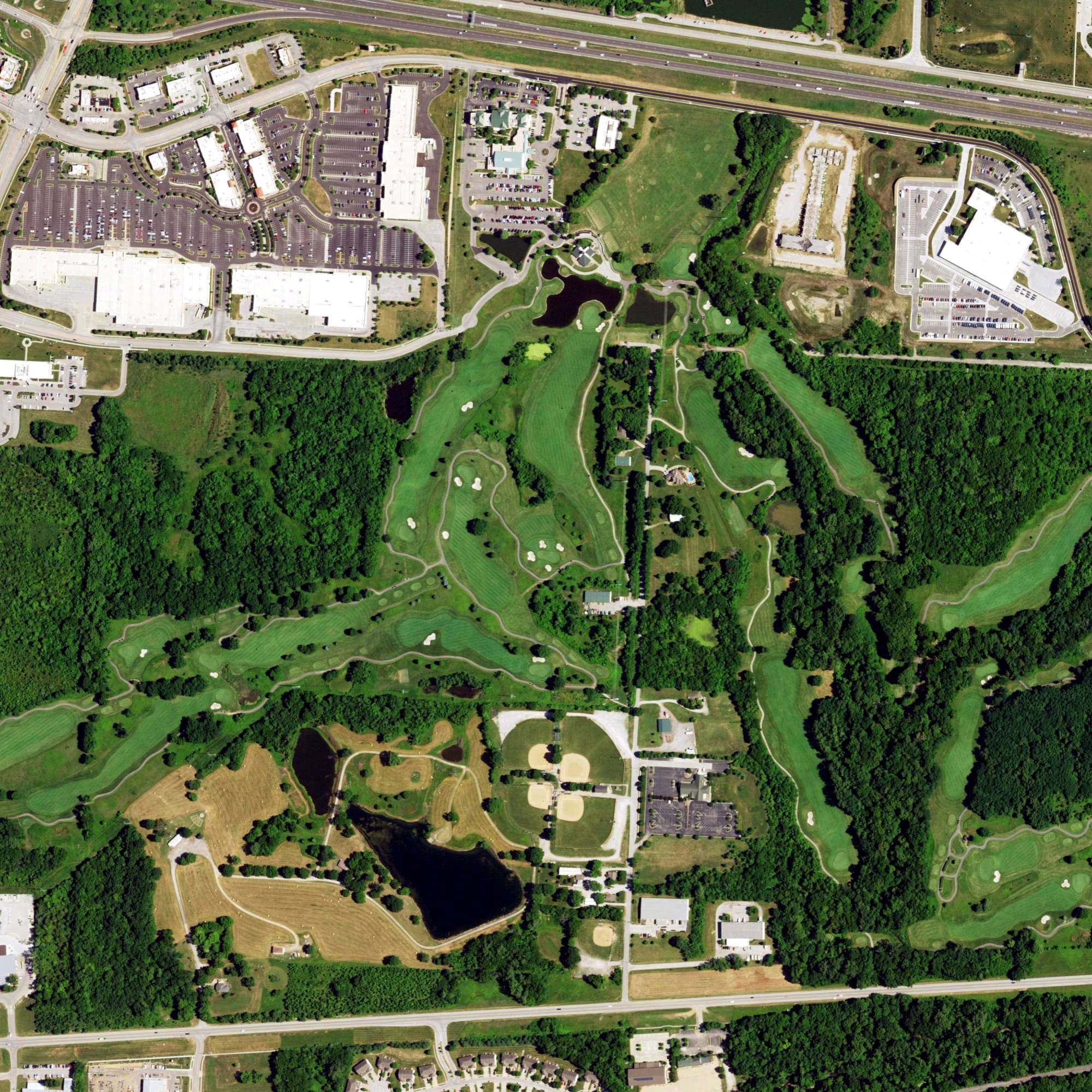 Aerial view of Adams Pointe Golf Course, MO, with its hole routing marked