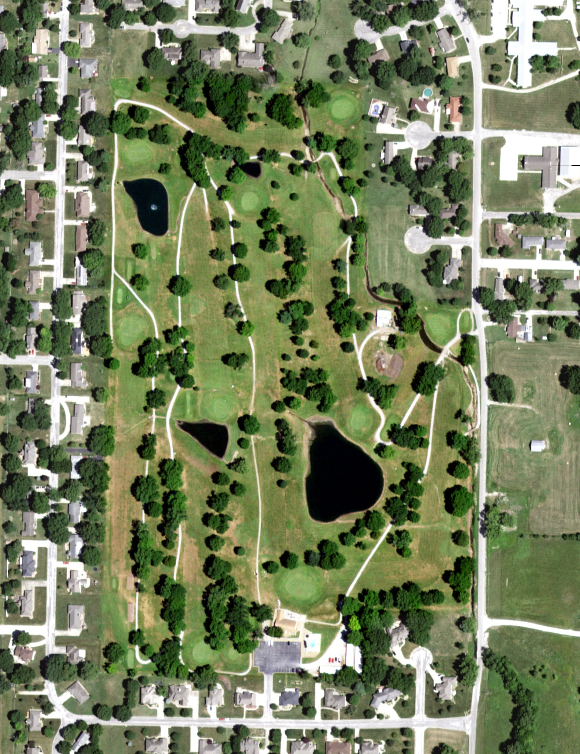 Aerial view of Butler Country Club Golf Course, MO, with its hole routing marked