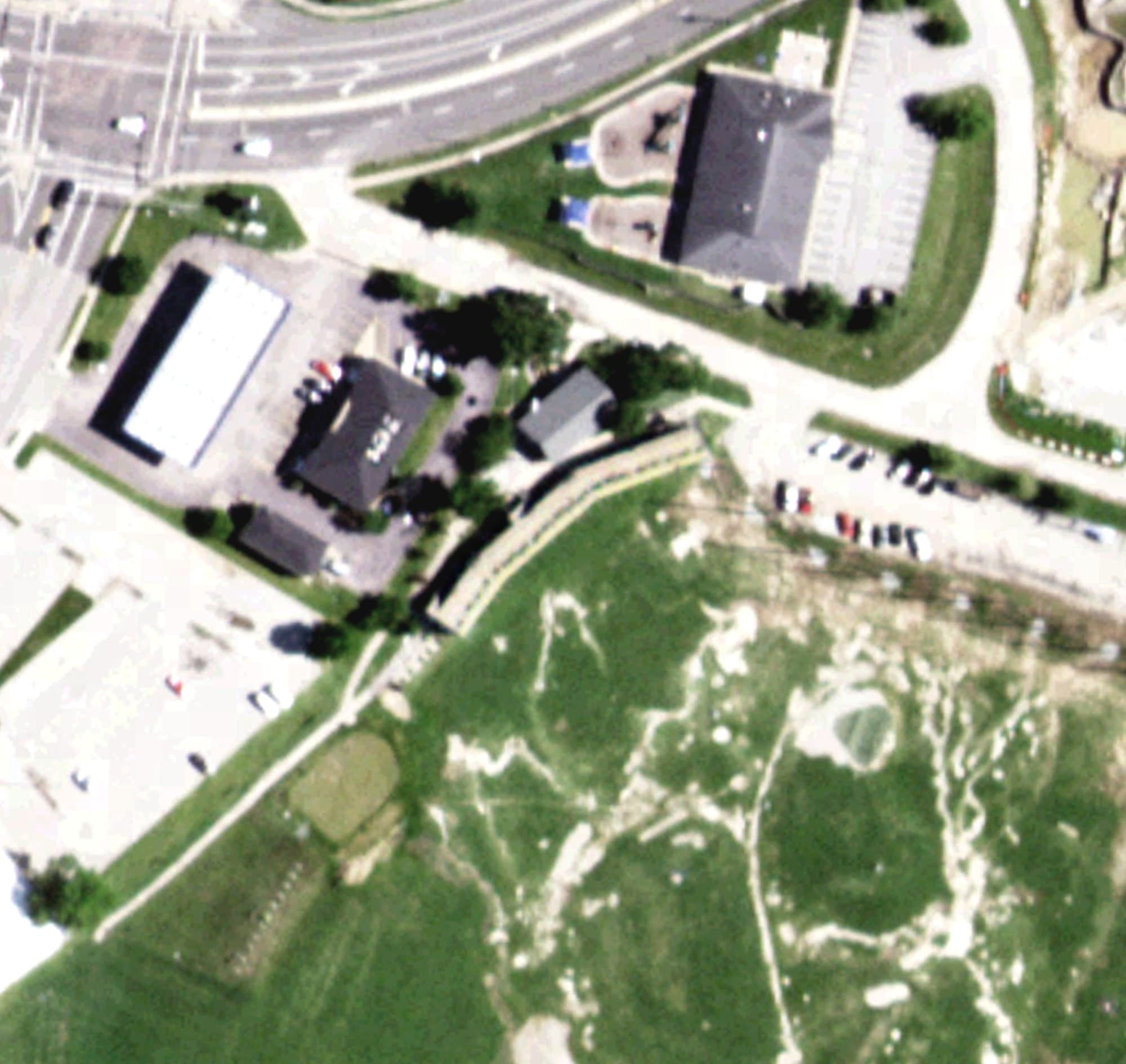 Aerial view of Driving Range, MO, with its hole routing marked