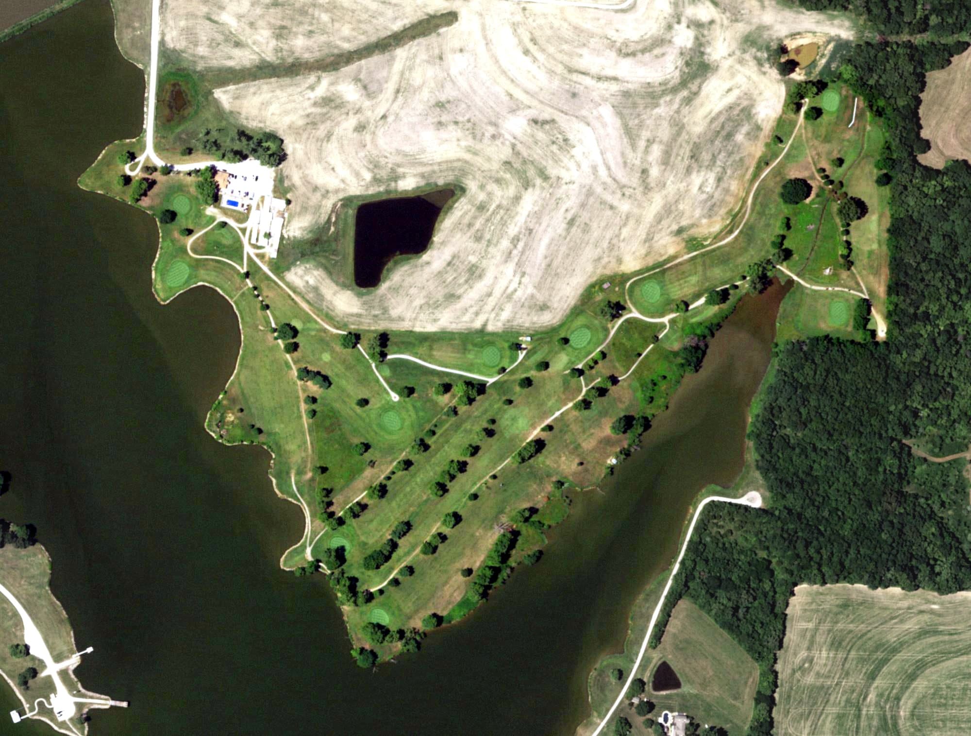 Aerial view of Higginsville Country Club, MO, with its hole routing marked