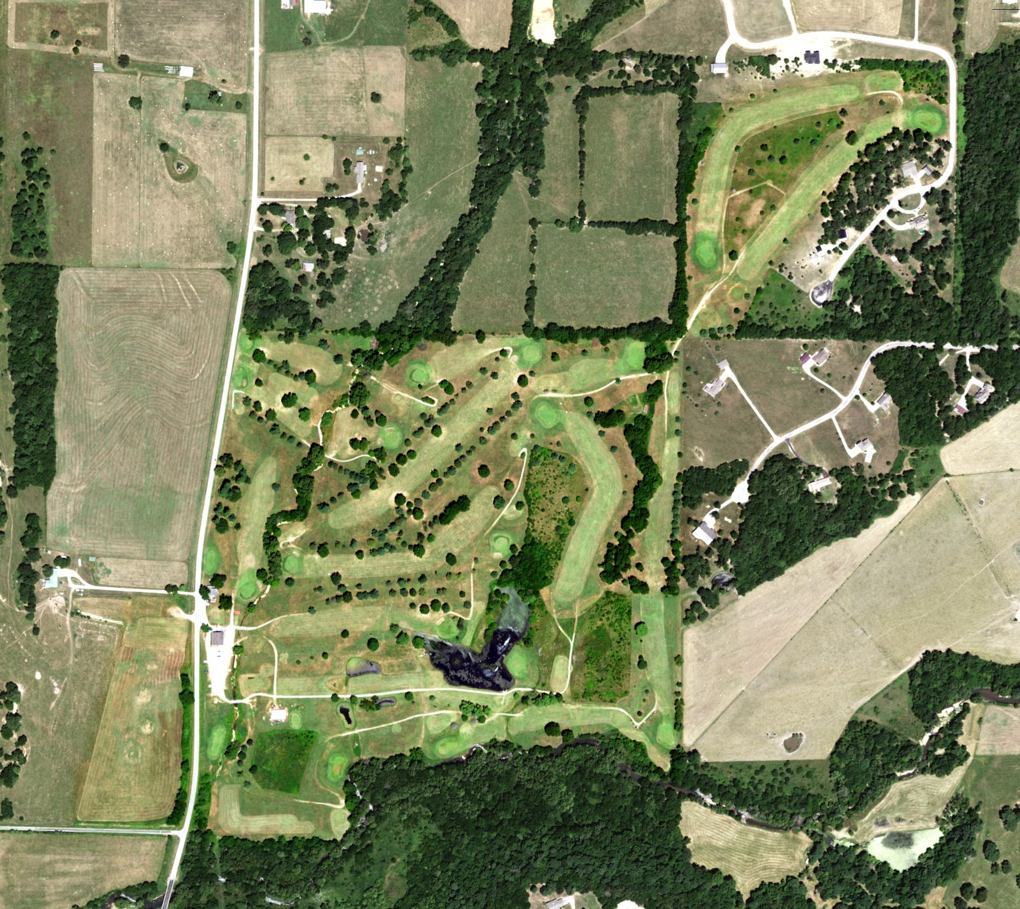 Aerial view of Honey Creek Golf Club, MO, with its hole routing marked