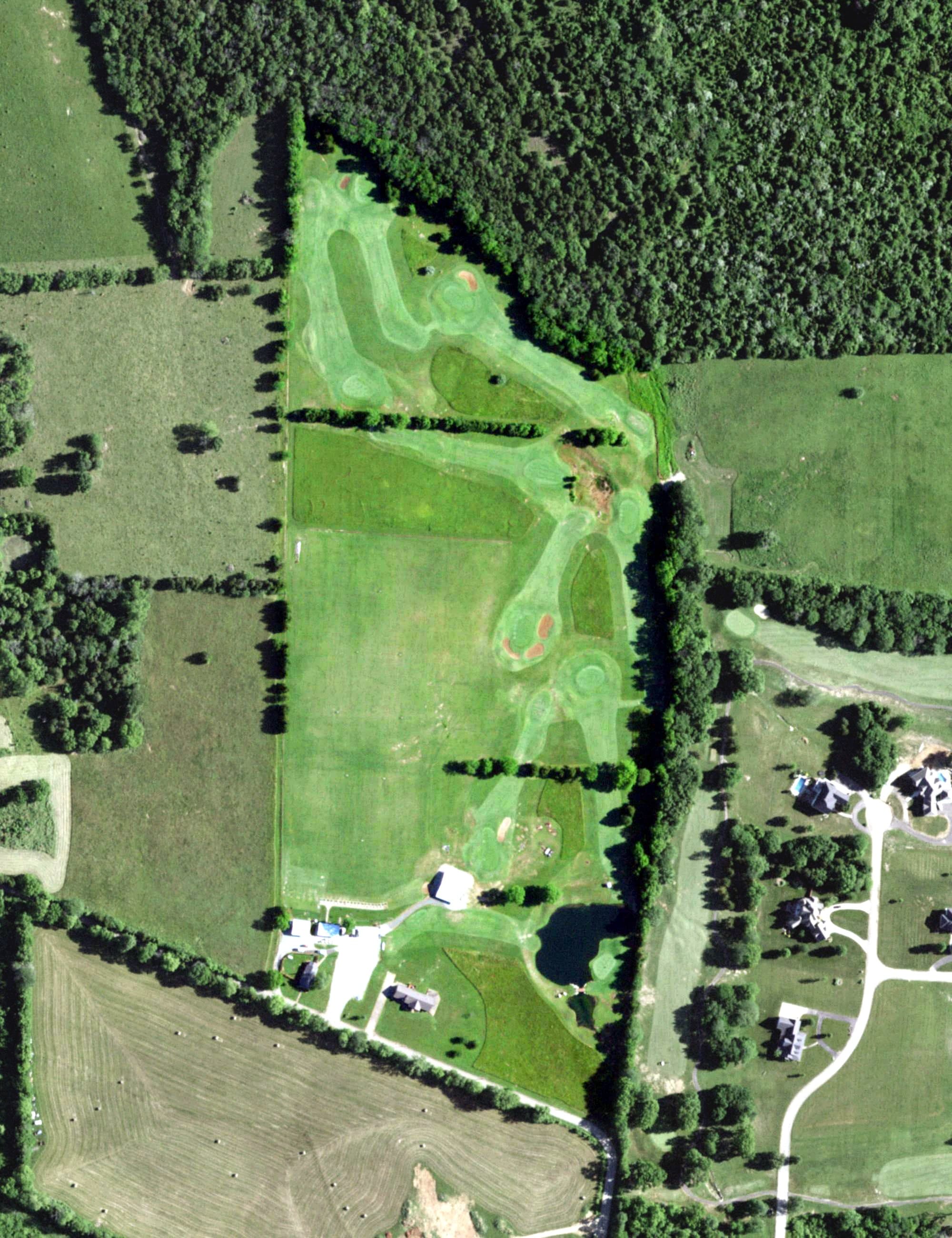 Aerial view of Hurryville Driving Range, MO, with its hole routing marked