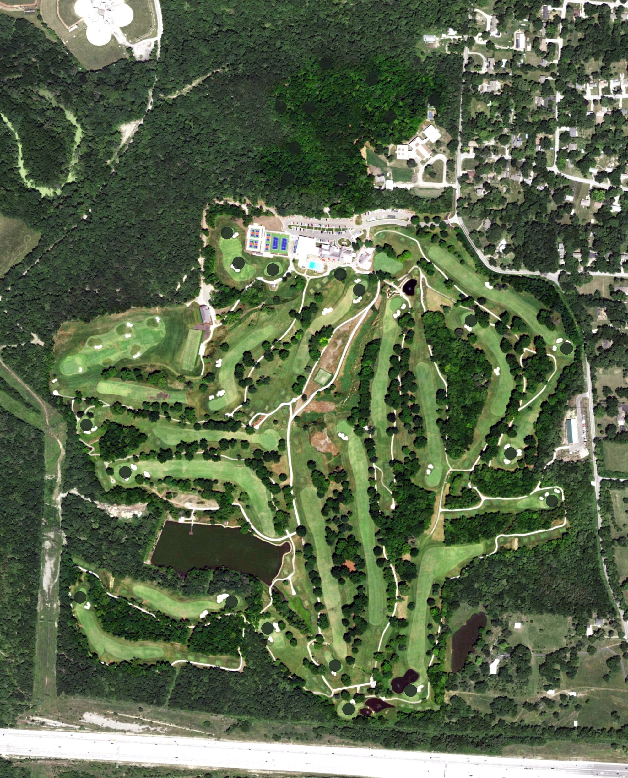 Aerial view of Oakwood Country Club, MO, with its hole routing marked